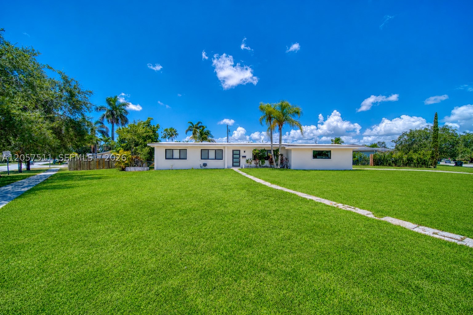 Pool home on an oversized corner lot in desirable Palmetto Bay. This beautifully renovated 3-bedroom, 2-bath home was completely rebuilt to the studs in 2023 and features a new roof, impact windows and doors, new plumbing, new electrical, and modern finishes throughout. The bright open concept layout features a designer kitchen with custom cabinetry, quartz countertops, stainless steel appliances, a gas range, and an oversized island overlooking the living and dining areas. Step outside to a covered patio, sparkling pool, spacious yard with avocado and coconut palms, creating the perfect setting for year-round entertaining. Spa-inspired bathrooms, generous bedrooms, and a two-car garage complete this move-in-ready home. A rare opportunity to enjoy modern style and exceptional indoor-outdoor living in beautiful Palmetto Bay.