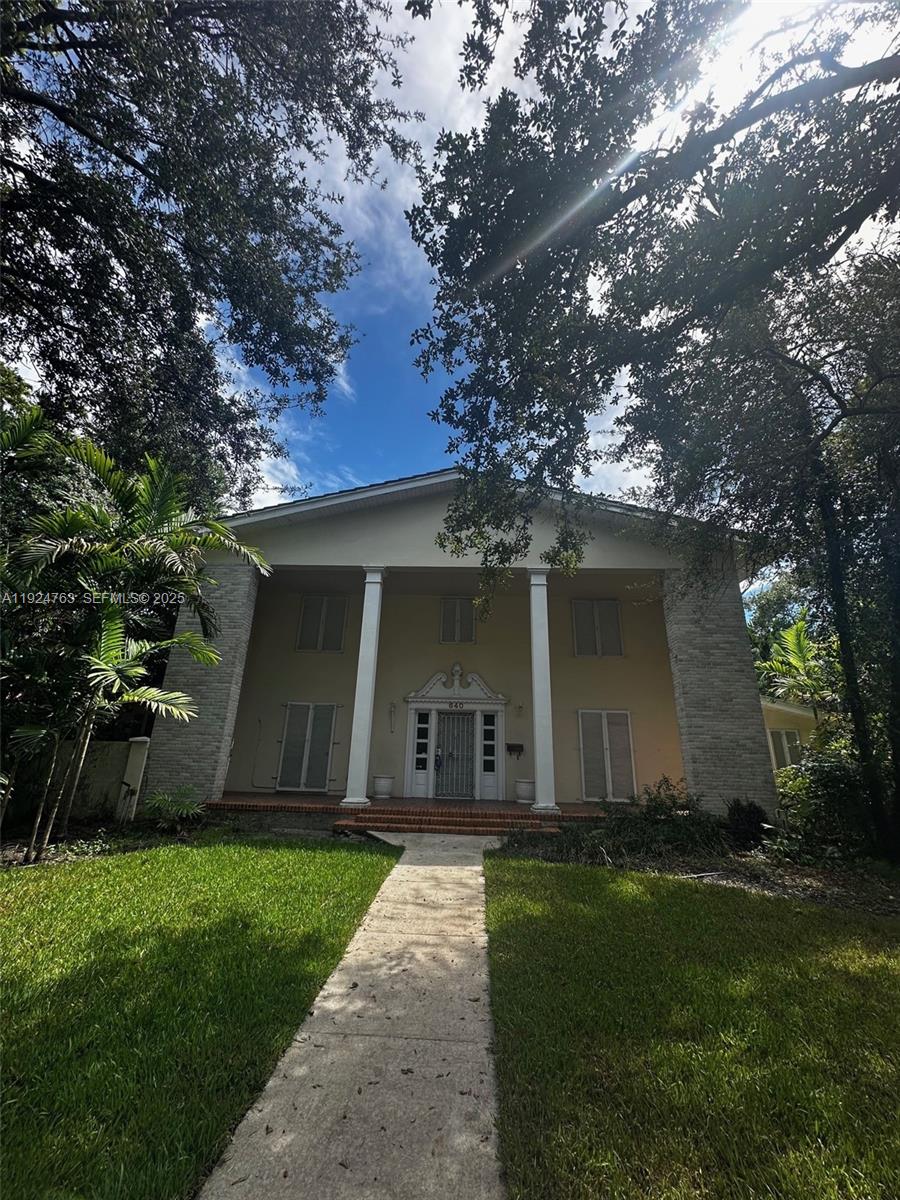 Traditional colonial home for sale. This fixer-upper offers excellent bones and a brand-new roof installed in 2026. With 4 bedrooms and 4 bathrooms, the home is full of classic charm and solid structure, ready for a new owner to bring fresh vision and transform it into a standout residence that truly shines. 

The property also features an enormous 2-car detached garage and a huge pool accented with classic Miami stone finishes—perfect for creating a private outdoor retreat. Situated in an excellent location on the exclusive Grand Concourse, this home combines character, scale, and setting, offering a rare opportunity in one of the area's most desirable neighborhoods.

*Currently being renovated, to include master ground level suite addition. See attachments for floor plans.