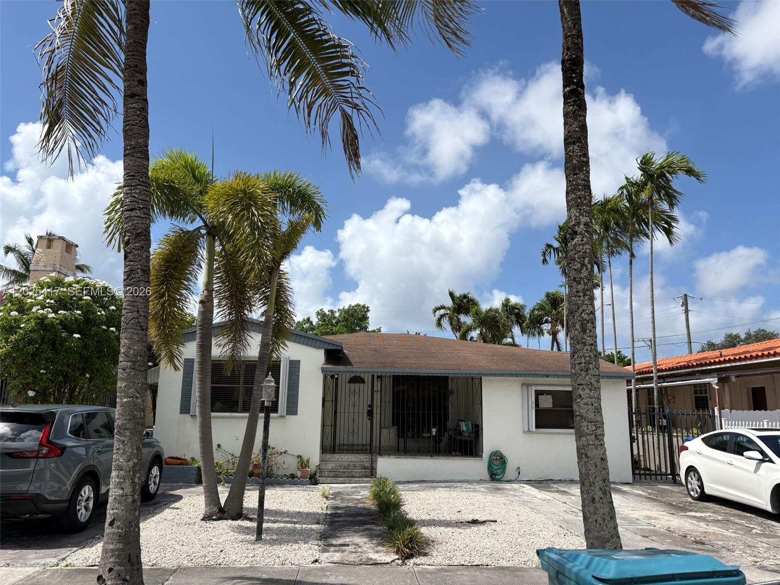 Exceptional opportunity in the highly desirable Shenandoah neighborhood of Miami! This single-family residence features a spacious in-law quarters with private entrance, ideal for extended family, guests, or additional income potential. Main House consists of 3 bedrooms 2 baths. Attached Guest Quarters is a 1-1. Main house updated 3 years ago. The property also includes a detached rear storage structure that can easily be converted into a second in-law suite or efficiency. Centrally located near Coral Gables, Brickell, Calle Ocho, dining, shopping, and major highways. Great opportunity for investors or end-users seeking flexible living arrangements in one of Miami’s most sought-after neighborhoods.