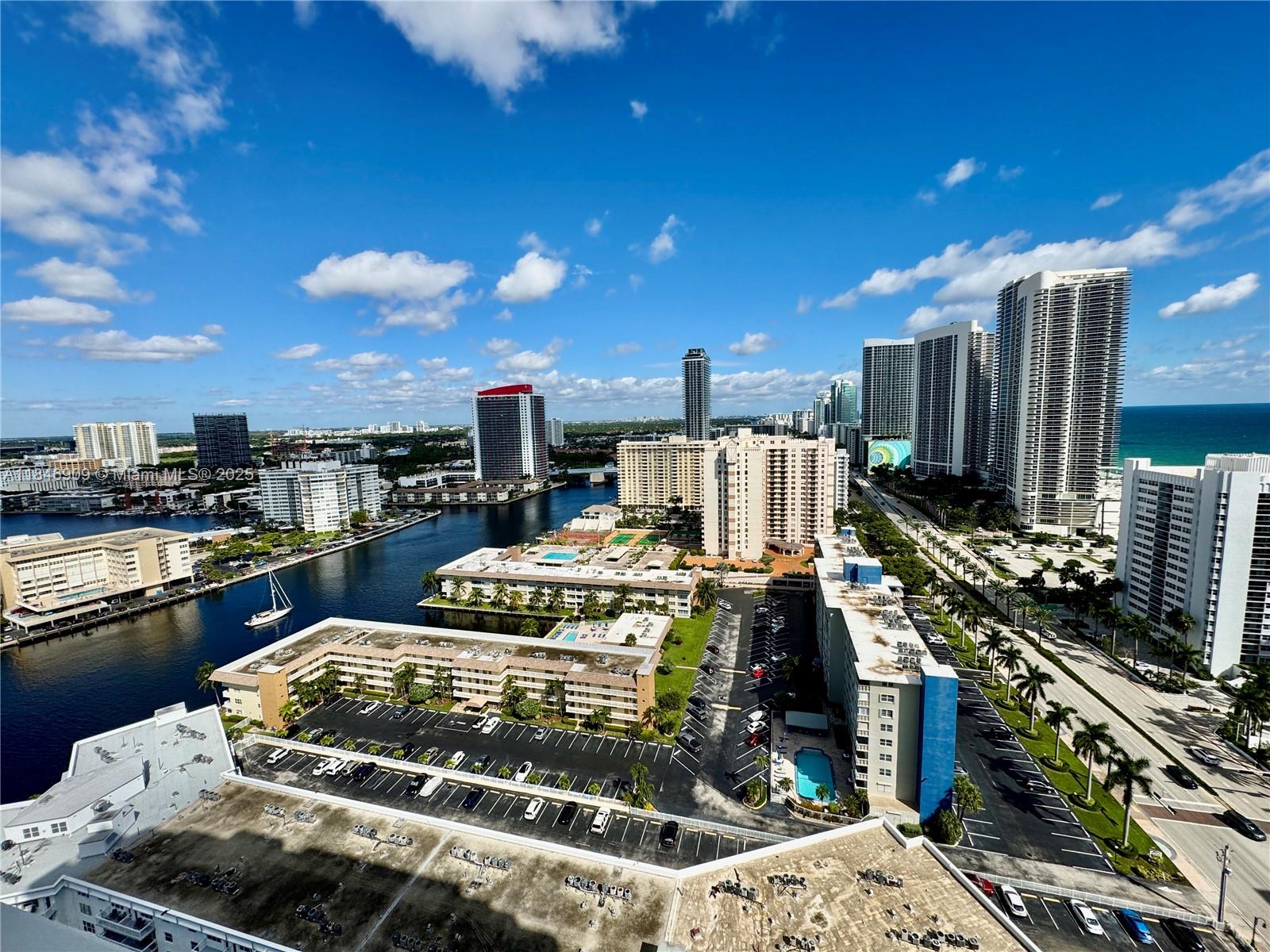 Resort-style condo with stunning beach and Intracoastal views in a prime location! This modern high-rise is just steps away from a quiet stretch of pristine white sand beach. Featuring style and comfort, it offers an Italian kitchen with stainless steel appliances, granite countertops, and quality cabinetry. Floor-to-ceiling windows brighten the living and bedroom spaces, which include a spacious closet and bathroom. The den doubles as a second bedroom or office. Enjoy the convenience of an in-unit washer and dryer. Nearby is Aventura Mall Gulfstream Park horse racing, the Hard Rock Casino-Hotel, and golf at the Diplomat Country Club. Amenities include an Intracoastal infinity pool, state-of-the-art fitness center, hot tub, conference room, club room, 24-hour front desk, and valet parking. investor unit ith a tenant paying $2,650.00 per month until  2/20/2027