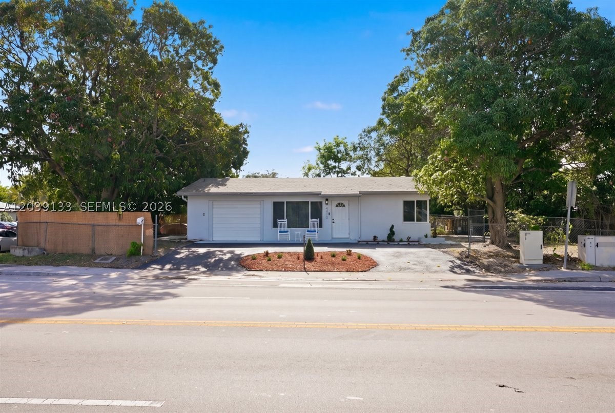 Fully Renovated & Move-In Ready! Beautiful 3-bedroom, 2-bathroom home with a 1-car garage situated on a fenced corner lot. This stunning property features full impact windows, new water heater, and a new 2023 shingle roof, offering peace of mind, energy efficiency, and lower insurance costs.

The home boasts a modern kitchen with brand-new cabinetry, countertops, and stainless-steel appliances, along with fully renovated designer bathrooms and luxury flooring throughout. 

Enjoy outdoor living in the upgraded backyard surrounded by mature fruit trees, perfect for relaxing or entertaining. Grass has been AI Enhanced. NO HOA. Conveniently located just 10 minutes from the beach and near shopping, restaurants, schools, Broward Health North, US-1, and I-95.

Turn-key and ready for its new owners. Seller is motivated and may contribute toward buyer's closing costs with an acceptable offer.
