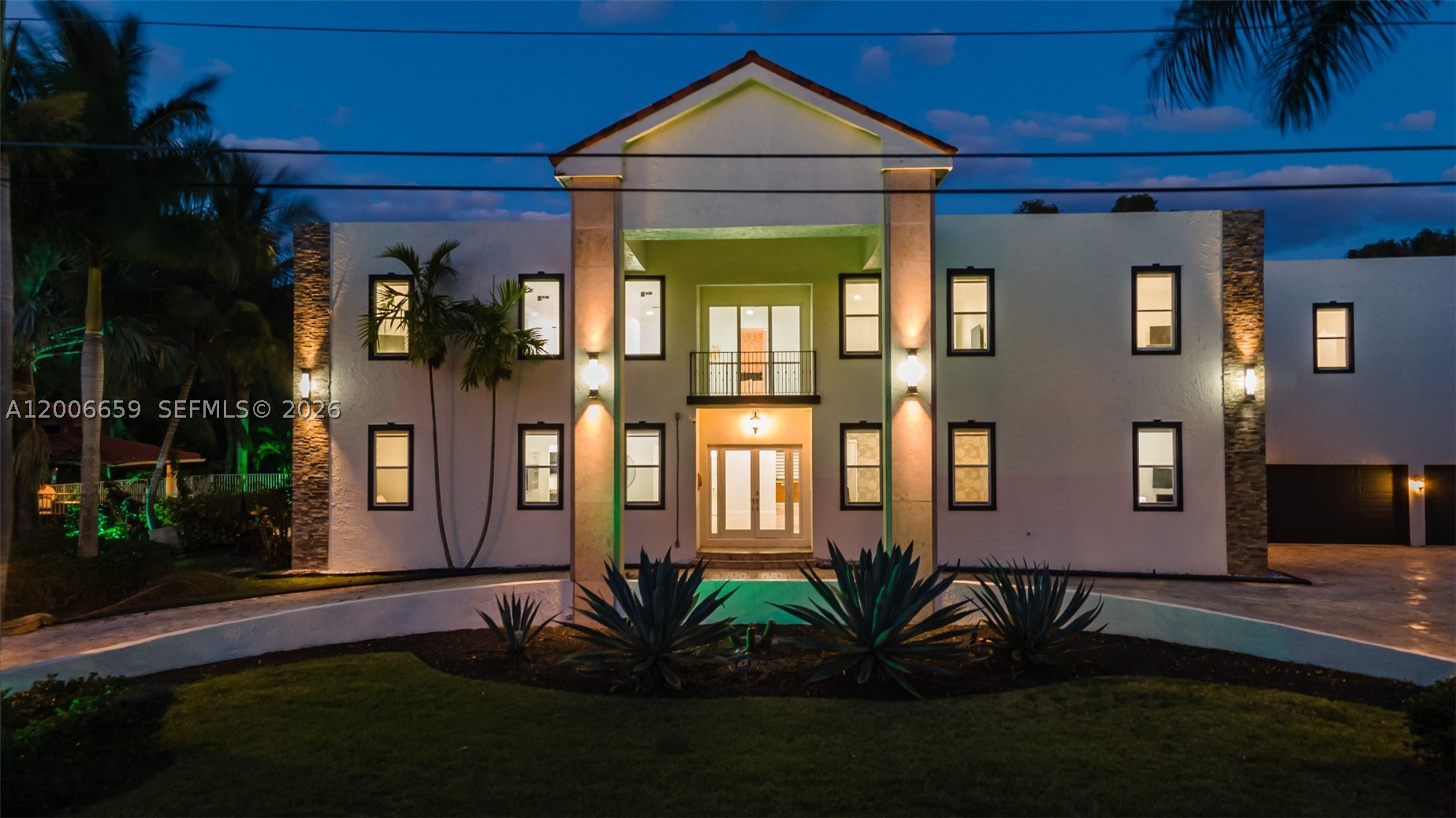 Big homes are common—this one is on another level. Located in the highly sought-after Plantation Acres, this estate delivers true scale, privacy, and presence—something increasingly rare in today’s market.
Spanning over 8,000 sq ft, this 9-bedroom, 6-bath residence is defined by soaring ceilings, massive living spaces, and an incredible sense of openness throughout. Every room feels oversized, from the expansive main living areas to the generously sized bedrooms—ideal for large families, multi-generational living, or hosting on a grand scale.
At the heart of the home is a chef’s kitchen that seamlessly connects to multiple gathering areas, making entertaining effortless. A dedicated home theater and an expansive game room elevate the experience, creating a true in-home entertainment hub.
Set on a huge lot with a massive driveway and oversized garage, the property offers both privacy and functionality—perfect for multiple vehicles, guests, or simply enjoying the wide-open space that Plantation Acres is known for.
The backyard is your private retreat, complete with a pool and endless room to expand, entertain, or design a resort-style outdoor oasis. The scale of the lot provides flexibility that’s rarely available.
Beyond the home, Plantation Acres is one of Broward County’s most desirable communities—known for its quiet, estate-style living, spacious properties, and access to top-rated schools.