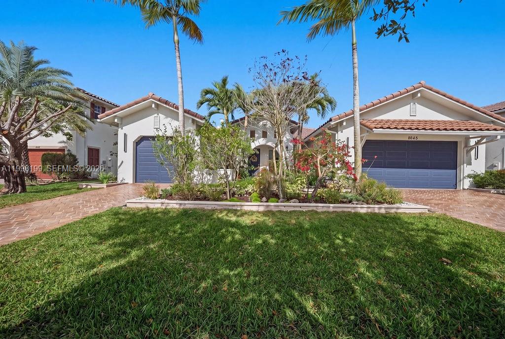 Experience refined living in this beautifully upgraded residence featuring 4Beds plus an office, 3 full baths, located in one of the newest subdivisions of Heron Bay, built under updated Florida building codes for enhanced safety, durability, and modern standards. This home welcomes you w/ new designer laminate flooring, exceptional natural light, and expansive walk-in closets with custom wood built-ins, offering both elegance and functionality.The newly renovated kitchen showcases sleek white quartz countertops, premium cabinetry, and a contemporary layout designed for everyday comfort and entertaining. Step outside to your private retreat: a resort-style pool equipped with a turbo-jet system that allows you to jog or swim against the water stream, an elegant pergola, and a breathtaking infinite lake view overlooking a preserved natural habitat with native flora and fauna. The serene water backdrop creates a unique sense of openness, privacy, and connection with nature.Additional highlights include a 3-car attached garage, a bright and open floor plan, and a desirable west-facing front exposure that enhances the home’s natural light. Living in Heron Bay means enjoying an unmatched lifestyle with two clubhouses, multiple pools, state-of-the-art fitness centers, tennis and pickleball courts, basketball courts, playgrounds, walking trails, 24/7 gated security, and impeccably maintained landscaping. A rare opportunity to enjoy privacy, elegance, and world-class community living.
