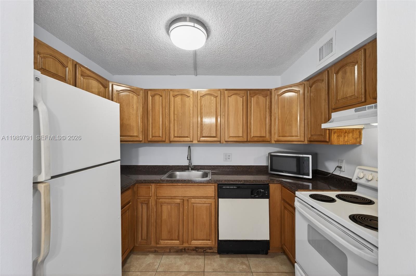 CORAL SPRINGS VILLAS COND - Residential