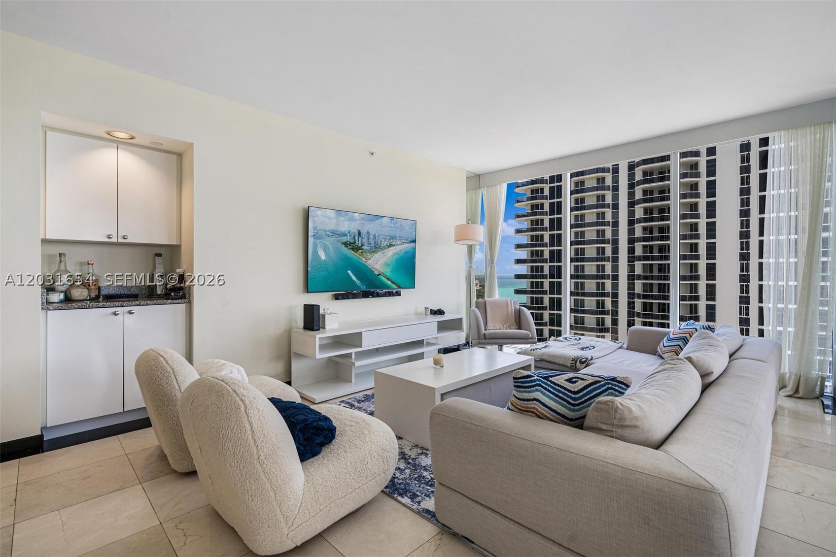 Welcome home to the Blue Diamond, one of Miami Beach's most beloved oceanfront addresses on prestigious Millionaires Row. Unit 2305 is a beautifully furnished 2-bedroom, 2-bathroom residence combining the comfort of a true home with breathtaking direct ocean views from a private balcony. Floor-to-ceiling windows flood the space with natural light and frame the Atlantic as your daily backdrop. Split floor plan, spacious bedrooms, and thoughtfully curated furnishings make this an effortless turnkey residence.
The Blue Diamond stands in a class of its own. The building's 16,000-square-foot beachfront clubhouse features his-and-her saunas and steam rooms, two whirlpools, and state-of-the-art fitness equipment. Residents enjoy direct beach access, adult and children's pools, tennis courts, a billiards and entertainment room, a café by the pool, 24-hour security, and concierge services. Personal trainers, business center, children's playroom, valet, and a café/market with room service round out an amenity package that truly covers every aspect of daily life.
Situated between the Atlantic Ocean and Indian Creek, Millionaires Row offers the rare combination of oceanfront living and year-round ocean breezes. Minutes from South Beach, Bal Harbour Shops, the Miami Design District, and Miami International Airport. Annual lease. Available August 3rd.