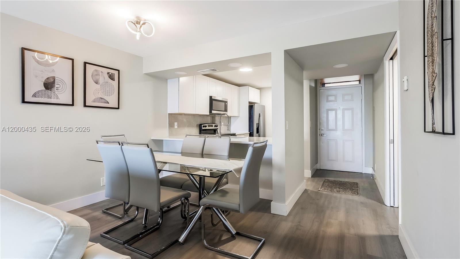 Welcome to this beautifully fully renovated 2-bedroom, 2-bathroom condo located in a pristine 55+ community. This move-in-ready home features a brand-new A/C system and sleek stainless steel appliances, offering modern comfort and style throughout. Enjoy a spacious layout with a large private patio overlooking serene waterfront views, perfect for relaxing or entertaining.

The meticulously maintained community offers an array of amenities, including three heated pools, shuffleboard, tennis courts, billiards, and scenic walking/jogging paths. With a low maintenance fee that covers water, trash, insurance, and more, this property provides exceptional value and easy living. Conveniently located close to shopping, dining, and everyday essentials. Truly Florida living at its finest!
