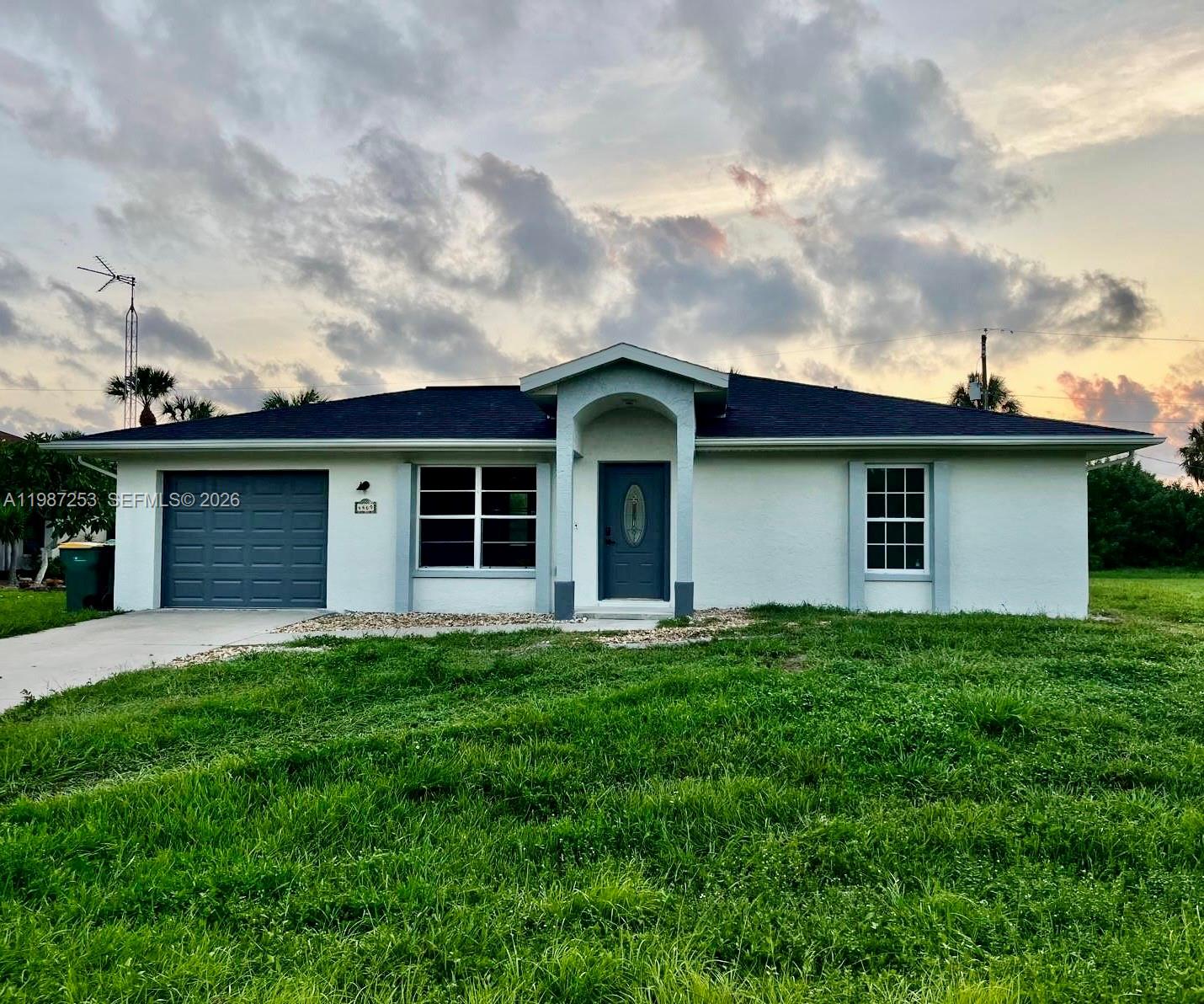 Charming 3-bedroom, 2-bathroom home located in a quiet and desirable area of Port Charlotte. This property features vinyl flooring throughout the home and a remodeled guest bathroom, offering comfort, style, and easy maintenance. The home includes a spacious Florida room and lanai area, perfect for relaxing or entertaining while enjoying the Florida lifestyle. The triple sliding doors allow plenty of natural light and create a seamless flow between indoor and outdoor living spaces. Step outside to a lush backyard with a cozy firepit, ideal for gatherings, outdoor dining, or simply enjoying peaceful Florida evenings. This home offers great potential and is ready for your personal touches to make it truly your own. Conveniently located near shopping, dining, parks, and everyday amenities. Schedule your showing today and discover the possibilities this home has to offer.