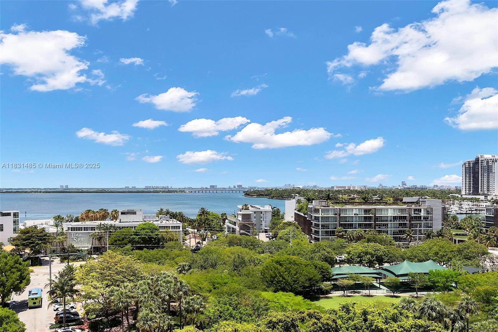 Seize the chance to own this exquisite 3/3 2488 SF unit in a luxury building in one of the most walkable locations on Miami Beach. Breathtaking bay & park views, and a coveted boat slip accommodating up to a 48' boat included! The chef's kitchen is equipped with expansive pantries, a wine fridge, coffee & breakfast bars and open to the spacious living/dining rooms. Floor-to-ceiling windows + two large balconies provide panoramic views, perfect for dining, seating, and lounging. Primary Suite features a seating area, built-in desk, balcony access, enormous walk-in closet, and a spa-like ensuite with a soaking tub & separate shower.
Includes one covered parking spot; additional parking available for rent. Premium cable/internet included in maintenance. Pool is currently under renovation.