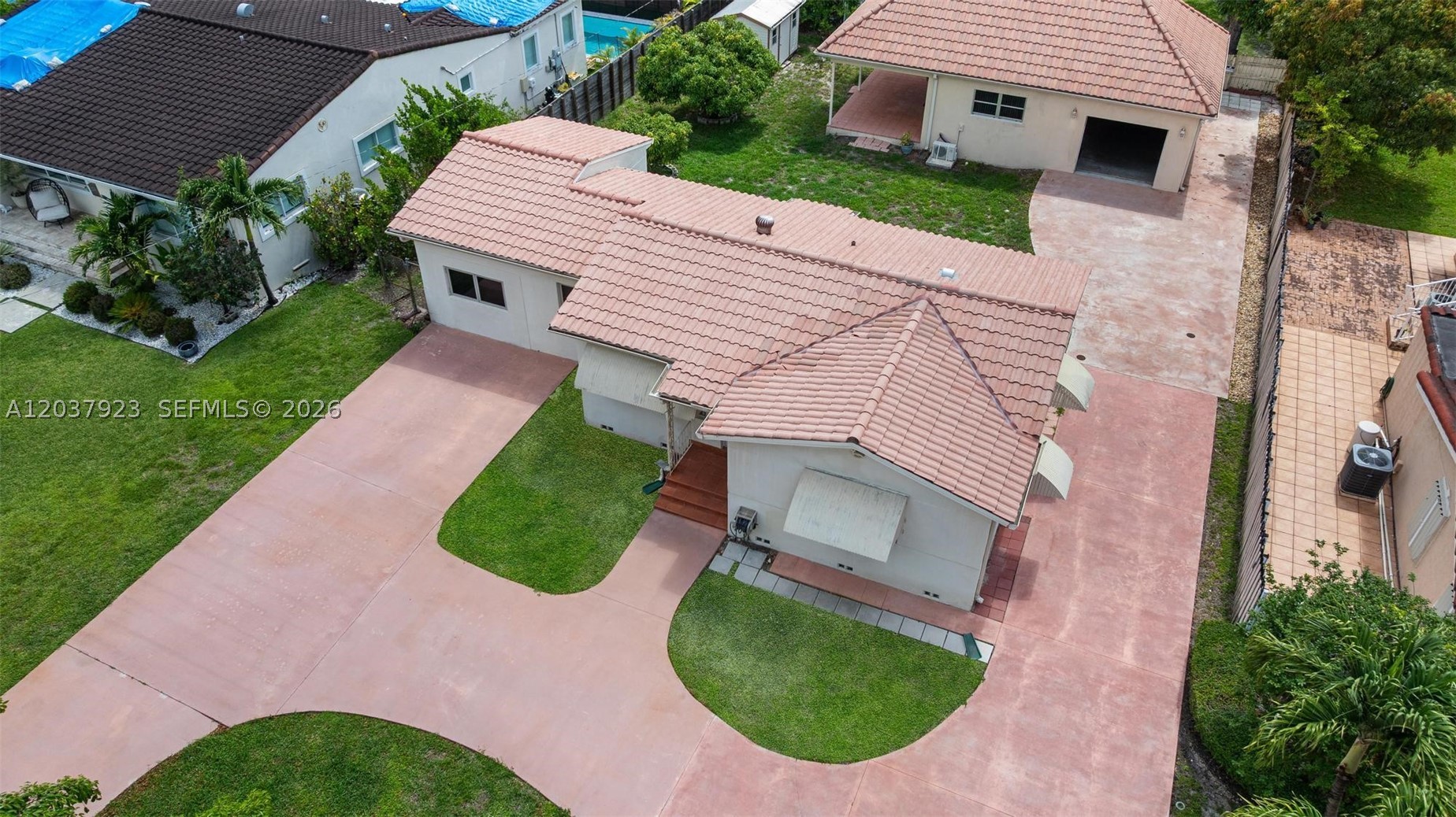 Miami Springs Opportunity! Located in the heart of the highly desirable City of Mia Springs, this versatile property offers a charming 2-bedroom, 1-bath main residence paired with a detached 1-bedroom, 1-bath in-law suite with its own garage—ideal for extended family and guests .The property features a spacious circular driveway providing ample parking and excellent curb appeal. The main home offers a comfortable layout with natural light and functional living spaces, while the detached guest quarters add flexibility and value.
Situated on a quiet street close to schools, parks, shopping, and major highways, this property presents a rare opportunity in one of Miami-Dade’s most established communities. Move in and enjoy.