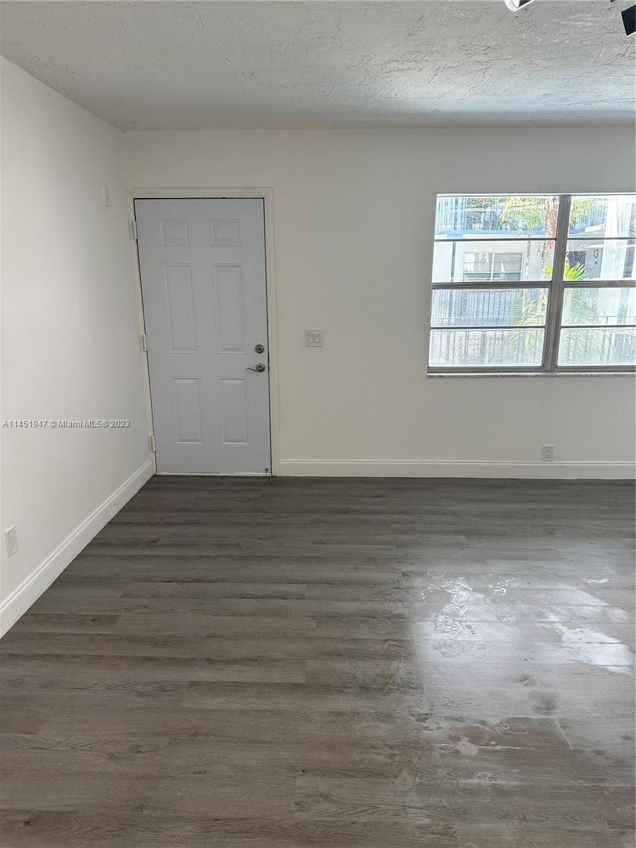 This condo is in the heart of North Miami and is located minutes away from the highways, beaches, prestigious Bal Harbour, and Aventura. The owner spared no expenses with a new AC unit, and stainless steel appliances, lighting. The bathroom and kitchen have been completely remodeled, with new porcelain and vinyl flooring, new cabinetry with soft close doors and draws, and doors inside and out. The building also recently underwent major renovations which include a new roof and painting. The association fee includes water and common area amenities. This unit is a must-see.a lot of light.