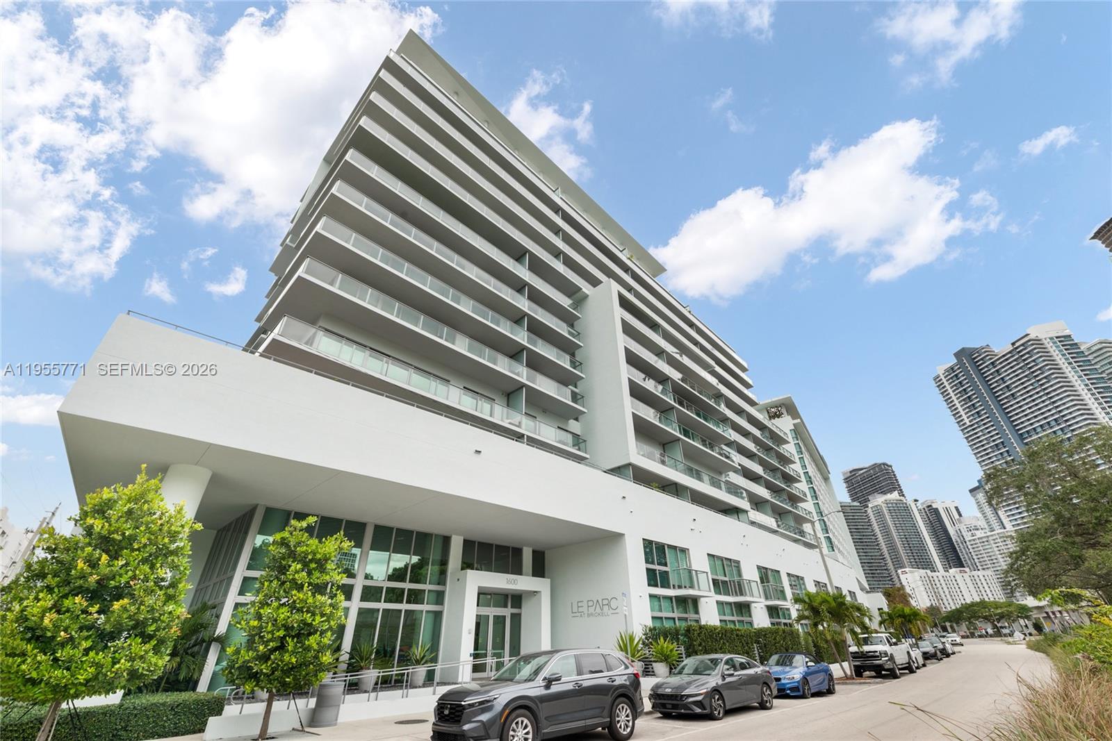 Wake up to Sunrise!  This 2-bedroom, 2.5-bath plus den residence at Le Parc Brickell, a boutique building of just 128 residences designed by architect Luis Revuelta. Ideally located across from lush Simpson Park, this East-facing home is filled with natural morning light and offers tranquil park views with distant Biscayne Bay Vistas. Enjoy a spacious 6-foot-deep private glass balcony, European-style kitchen and bath cabinetry, stainless steel appliances, porcelain flooring, and glass-enclosed showers. Residences in this boutique building rarely come to market. Amenities include pool, spa, fitness center, children’s playroom, rooftop sky lounge with Jacuzzi, clubroom, business lounge, pet-friendly environment, plus Wi-Fi, cable, water, and two assigned parking spaces.