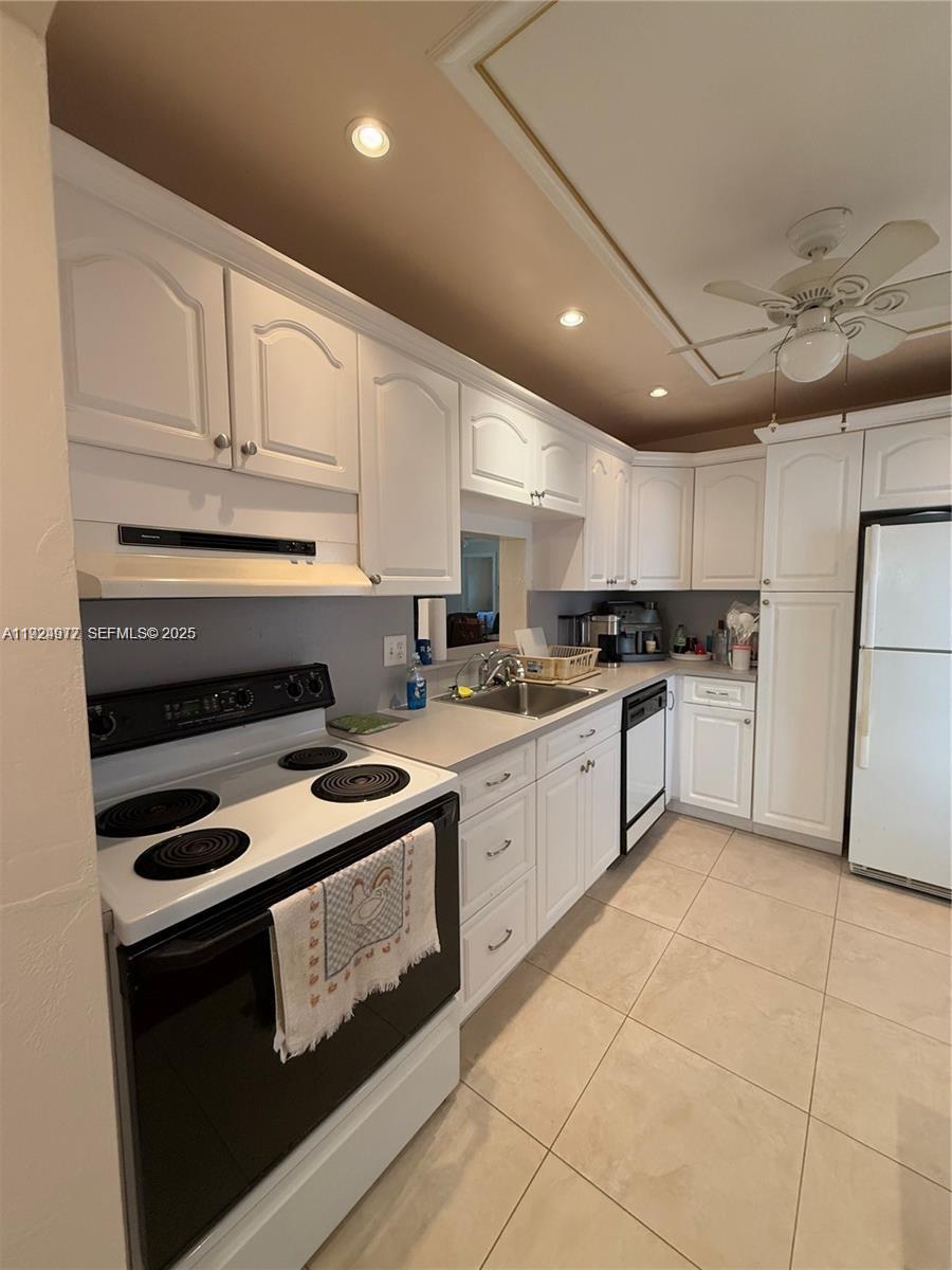 FURNISHED 2 BEDS/ 2 BATHS condo located in the 55+ community! This unit is located on the second floor and accessible by elevators or the staircase right next to the unit. CORNER unit and kitchen is equipped with a dishwasher. No carpet found throughout the unit and the bedrooms are well divided. Florida room is enclosed with windows and overlooks the clubhouse/pool area view. Spacious living area and primary bedroom has a walk-in closet. Hurricane IMPACT windows! Extra storage is located on the third floor and laundry is on the same floor as the condo. Parking spot is #45. Many amenities such as clubhouse, pool, gym, tennis etc! AC AND HEATER ABOUT 8 YEARS OLD.