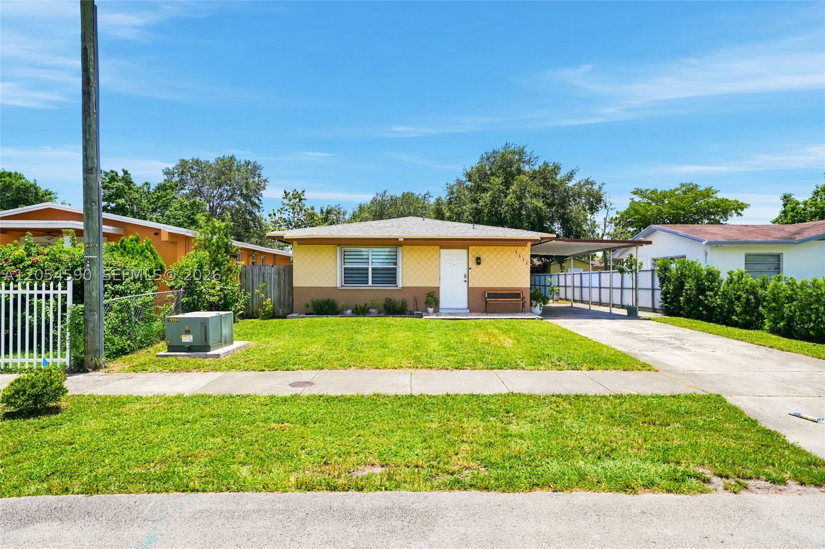 Welcome to 5632 SW 36th Court in West Park, a beautifully renovated 3-bedroom, 2-bath home that's completely move-in ready. Situated on a 5,000 sq. ft. fenced lot, this home has been thoughtfully updated with modern finishes throughout. Step inside to an open, bright floor plan featuring new oversized tile flooring, fresh interior paint, recessed lighting, and plenty of natural light. The updated kitchen offers white cabinetry, quartz-style countertops, stainless steel appliances, and ample storage, making it perfect for everyday living and entertaining. The spacious primary suite features a beautifully renovated ensuite bath with a modern double vanity and frameless glass walk-in shower, while the second bathroom has also been tastefully updated. Enjoy central air conditioning and heating for year-round comfort. Outside, the fully fenced backyard provides plenty of room for children, pets, entertaining, or future outdoor enhancements, while the storage shed offers additional space for tools and equipment. A covered carport and extended driveway provide convenient parking. Conveniently located near shopping, dining, schools, parks, major highways, Fort Lauderdale-Hollywood International Airport, and South Florida beaches, this home offers the perfect combination of modern updates, comfortable living, and an excellent location. Don't miss this exceptional opportunity to own a turnkey home in the heart of West Park!