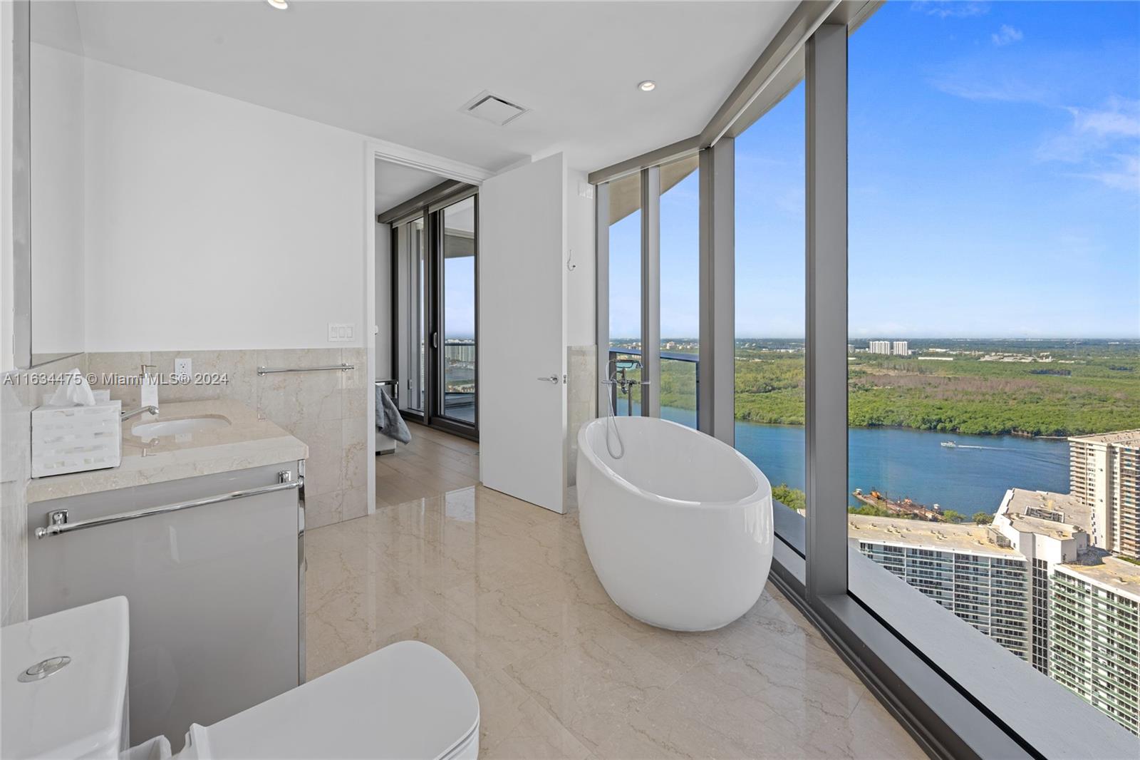 15701 COLLINS CONDO - Residential