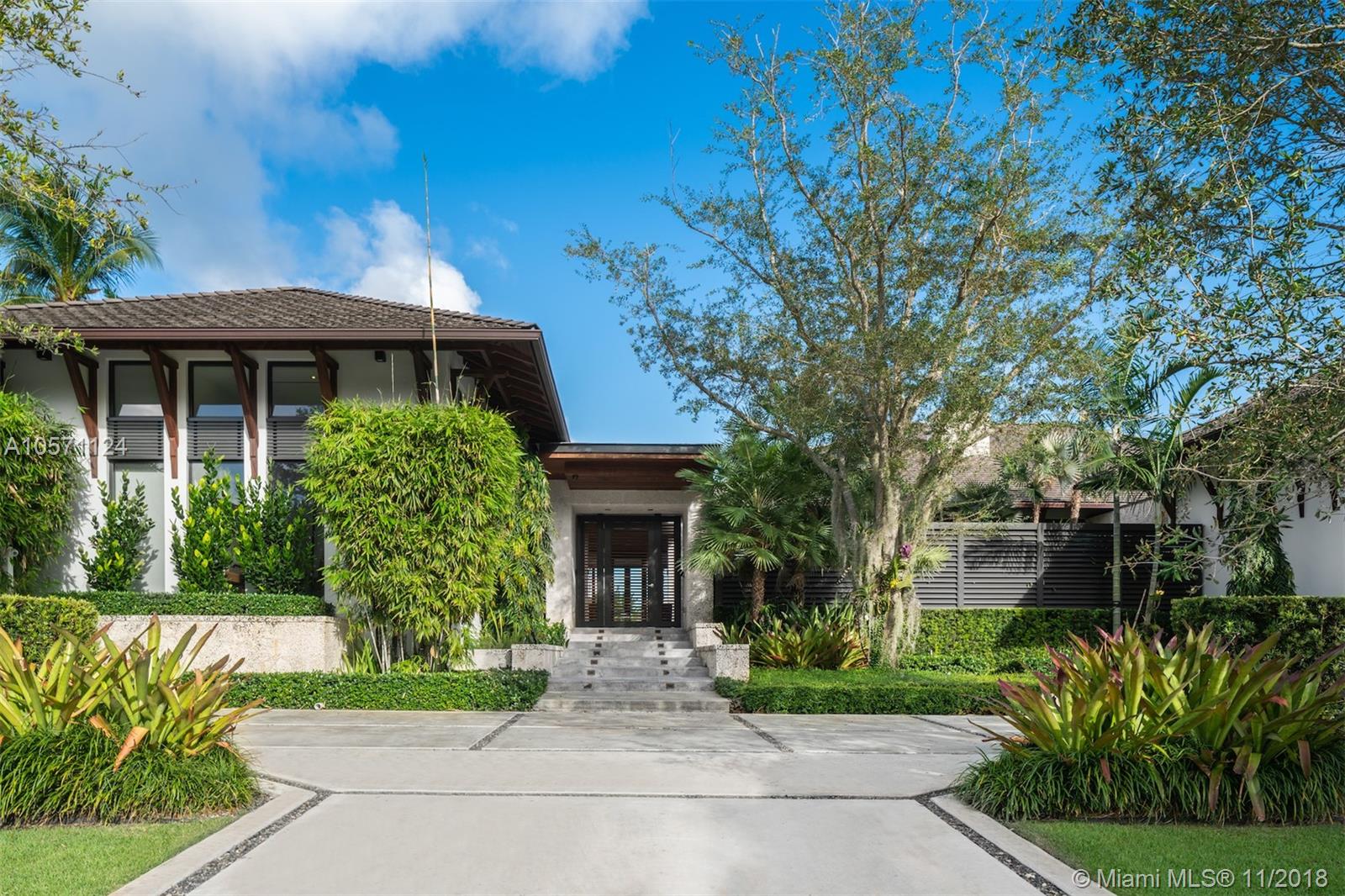 Truly an extraordinary one-of-a-kind home for the most discerning taste. This custom retreat was designed by notable Florida architect, Cesar Molina with no details spared in design. 162’ waterfront in desirable Old Cutler Bay, this home has it all. Walk on the water-immersed floating steps & be greeted with sleek limestone floors throughout the living areas & floor to ceiling sliding glass doors to welcome the natural light and fuse the outdoor & indoor living spaces. Kitchen shares space with informal dining, family room & wet bar with glass encased temperature controlled wine cellar. Relaxing Home Theatre with built-in sound, Office, Full Gym & Guest Room. Fully-equipped outdoor spaces include full Summer kitchen, gas fire pit, full cabana bath, 4-car a/c garage & full-home generator.
