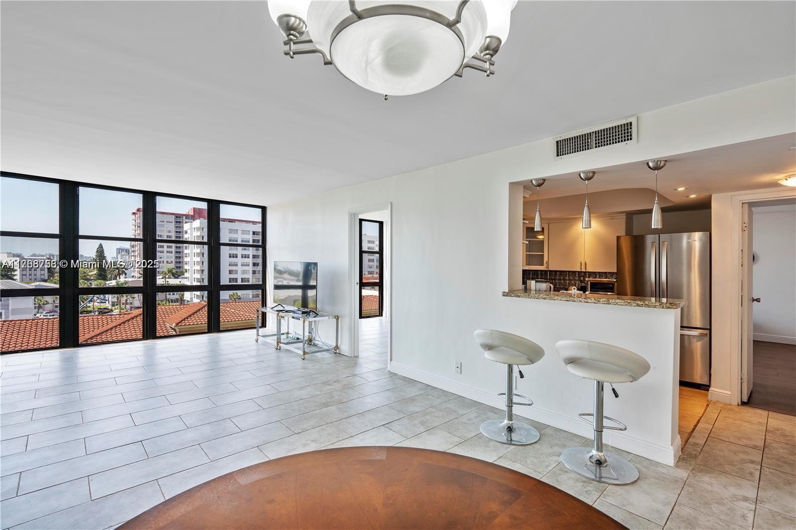 Prime Beachside Living - Perfect Location! This beautifully updated unit is across the street from the beach Offers spectacular Intracoastal views from the heated pool area with convenient BBQ grills. Unit Features: New Impact Floor-to-Ceiling Windows providing amazing views from every room Bright, spacious layout with tons of natural light Building Amenities: Gated complex with ample guest parking Amenities include: Gym, Sauna, Tennis Court, Shuffleboard, and more Heated pool overlooking the Intracoastal New Ac/ New water heater. Additional Perks: Cable and internet included in rent Close to Gulfstream Park, Aventura Mall, and just minutes from Fort Lauderdale Hollywood Airport This stunning location combines beachfront access with convenient amenities—a must-see!