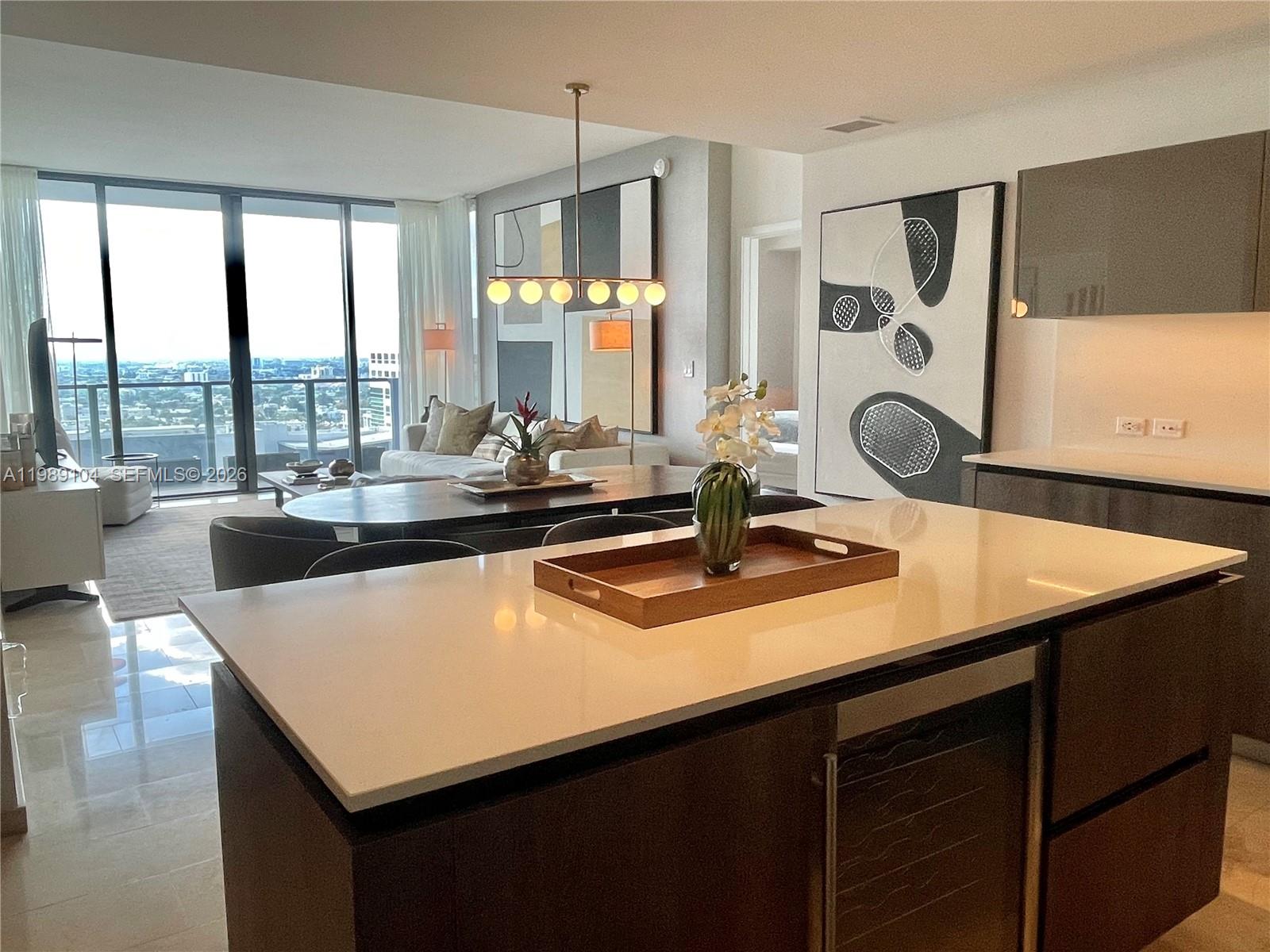 BEAUTIFUL 2+DEN WITH DOUBLE ASSIGNED PARKING, FURNISHED & FULLY EQUIPPED, READY TO MOVE IN. PREVIOUS SALES MODEL (ARTEFACTO FURNITURE, PRICE INCLUDES FURNITURE) FLOOR TO CEILINGS WINDOWS WITH GREAT NATURAL LIGHT. 2+DEN (DEN HAS A MURPHY BED AND CAN BE USED AS A 3RD BEDROOM). OUTSTANDING VIEWS TO THE BAY, RIVER & CITY. EUROPEAN DESIGN. UNIT IS LOCATED AT RISE CONDOMINIUM WITHIN BRICKELL CITY CENTRE. CLOSE TO EVERYTHING. METRO MOVER ACCESS. READY FOR IMMEDIATE OCCUPANCY. EASY TO SHOW. TWO PARKING SPACES. (TANDEM PARKING). SOLD TURN KEY.