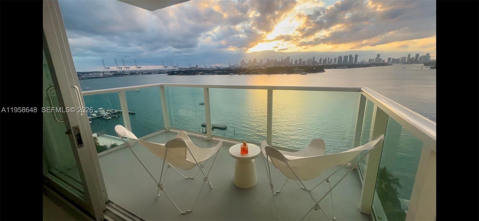 A Design-Forward Biscayne Bayfront Lifestyle in the Heart of South Beach

Wake up to shimmering bay views and sunlight streaming through every room of this refined corner residence, perfectly positioned in one of Miami’s most desirable neighborhoods. Thoughtfully redesigned by internationally renowned FORMA Design, this award-winning recent renovation received the Silver Award from the International Interior Design Association, blending architectural precision with effortless coastal living.

The home is offered fully furnished, featuring white porcelain floors, stainless-steel kitchen, and a dramatic carved relief wall panel illuminated by ambient LED lighting — a sophisticated backdrop for both quiet evenings and stylish entertaining. Every detail reflects modern, understated elegance.

Two serene, private bedrooms — including a bay-view en-suite — offer hotel-level comfort and privacy, while floor-to-ceiling, hurricane-impact glass doors open to glass balcony framing sweeping water views. The building itself was completely renovated in 2022 and offers a state-of-the-art fitness center.

Designed for ease and convenience, the residence includes WiFi and cable, as well as professional cleaning once per month, allowing you to focus fully on enjoying the Miami lifestyle.

Step outside to Whole Foods directly across the street and world-class dining, boutiques, cafés, and the energy of Lincoln Road just a short walk away. This is Miami living at its most elevated.
