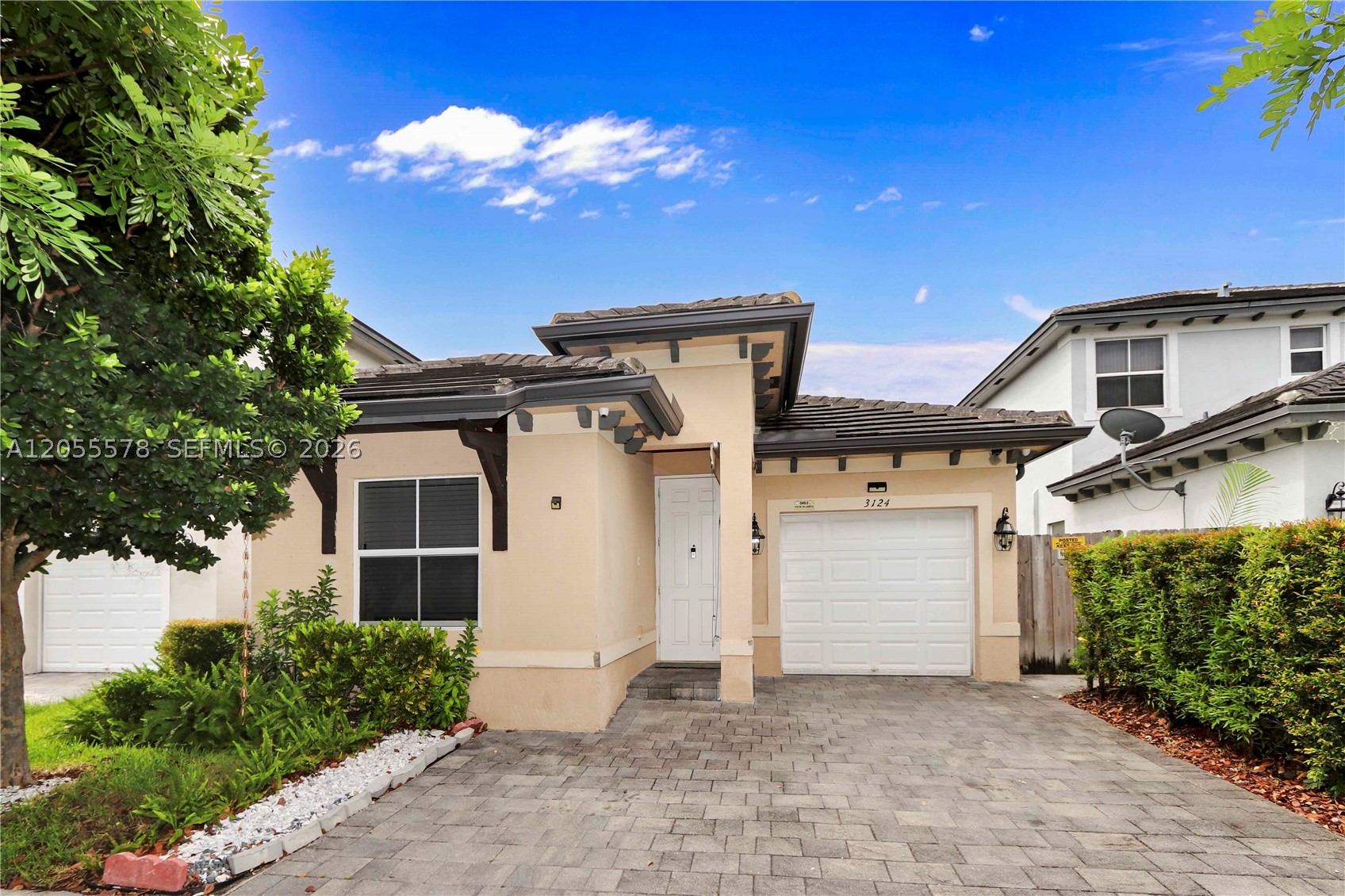 Welcome to your stunning, move-in-ready home in the sought-after Leeward Isles community! Built in 2017, this impeccably maintained 4-bedroom, 2-bathroom residence offers modern living at its finest with updated electrical, plumbing, and structural systems. You will love the open-concept layout, featuring a spacious kitchen with a large center island—perfect for entertaining. Enjoy the beautiful Florida weather in your private, fully fenced backyard with an open-air patio. This home combines comfort with incredible value, featuring a low monthly HOA fee of just $75. As a resident, you gain exclusive access to a resort-style clubhouse, a expansive pool with sun deck, a fitness center, and a children’s play area. Located in the heart of Homestead, you are minutes away from local shopping, dining, and easy access to major highways for commuting. Experience the perfect blend of modern construction, community amenities, and an unbeatable location