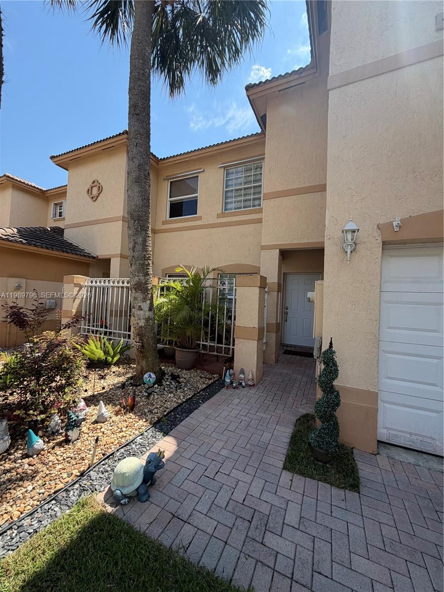Welcome to this beautifully upgraded 3-bedroom, 2.5-bath townhome in the sought-after gated community of Pembroke Isles. This move-in-ready residence showcases a modern open-concept layout with high-end finishes throughout, including updated flooring, a renovated kitchen with stylish cabinetry, and premium appliances. The spacious living and dining areas flow seamlessly, creating an ideal space for both everyday living and entertaining.

Upstairs features generously sized bedrooms, including a well-appointed primary suite with ample closet space and an updated bathroom. Additional highlights include a 1-car garage, upgraded fixtures, and a thoughtfully designed interior ready for immediate enjoyment.

Ideally located near major highways, shopping, dining, and everyday conveniences, this home offers both comfort and accessibility. Residents enjoy a well-maintained gated community with resort-style amenities. A great opportunity to own a turnkey property in a prime location.