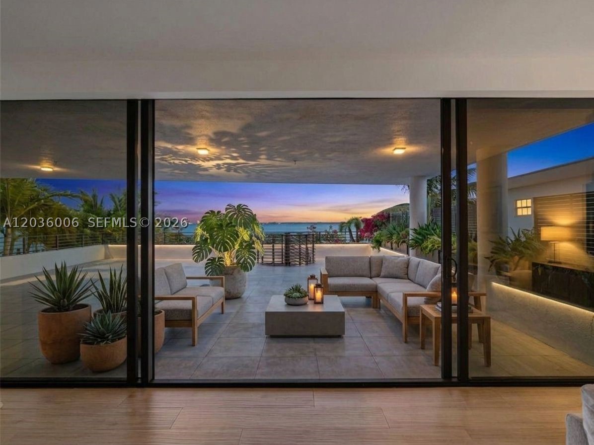 Welcome to one of Miami beach's  most exclusive waterfront addresses; an exceptionally rare full-floor bayfront residence, with only four private residences in the entire building. Crafted by renowned Sabal Luxury Builder, this newly constructed architectural masterpiece offers an unparalleled level of privacy, prestige, and waterfront living rarely available in today’s market. Positioned directly on Biscayne Bay, this trophy residence captures breathtaking panoramic views of the Downtown Miami skyline, Miami Beach, and endless open water vistas. Arrive via your private elevator & step into 2,551 SFT of impeccably curated living space, where floor-to-ceiling glass walls frame the surrounding waterfront. An integrated smart-home sound system, electric window treatments create an effortless blend of sophistication and comfort. Designed for those who appreciate seamless indoor-outdoor living, the residence opens to an extraordinary 1,800 SFT private waterfront terrace, an irreplaceable entertaining venue with front row seats to Miami’s legendary sunsets. The chef's Italian kitchen showcases premium appliances, an oversized gathering island, and elegant custom cabinetry, while every bedroom serves as a private retreat featuring its own en-suite bath and secluded terrace. Boutique luxury amenities include a state-of-the-art fitness center, jacuzzi, secure covered parking. Ideally located on Normandy Isles, just moments from Bal Harbour Shops, private clubs, & world class dining!!