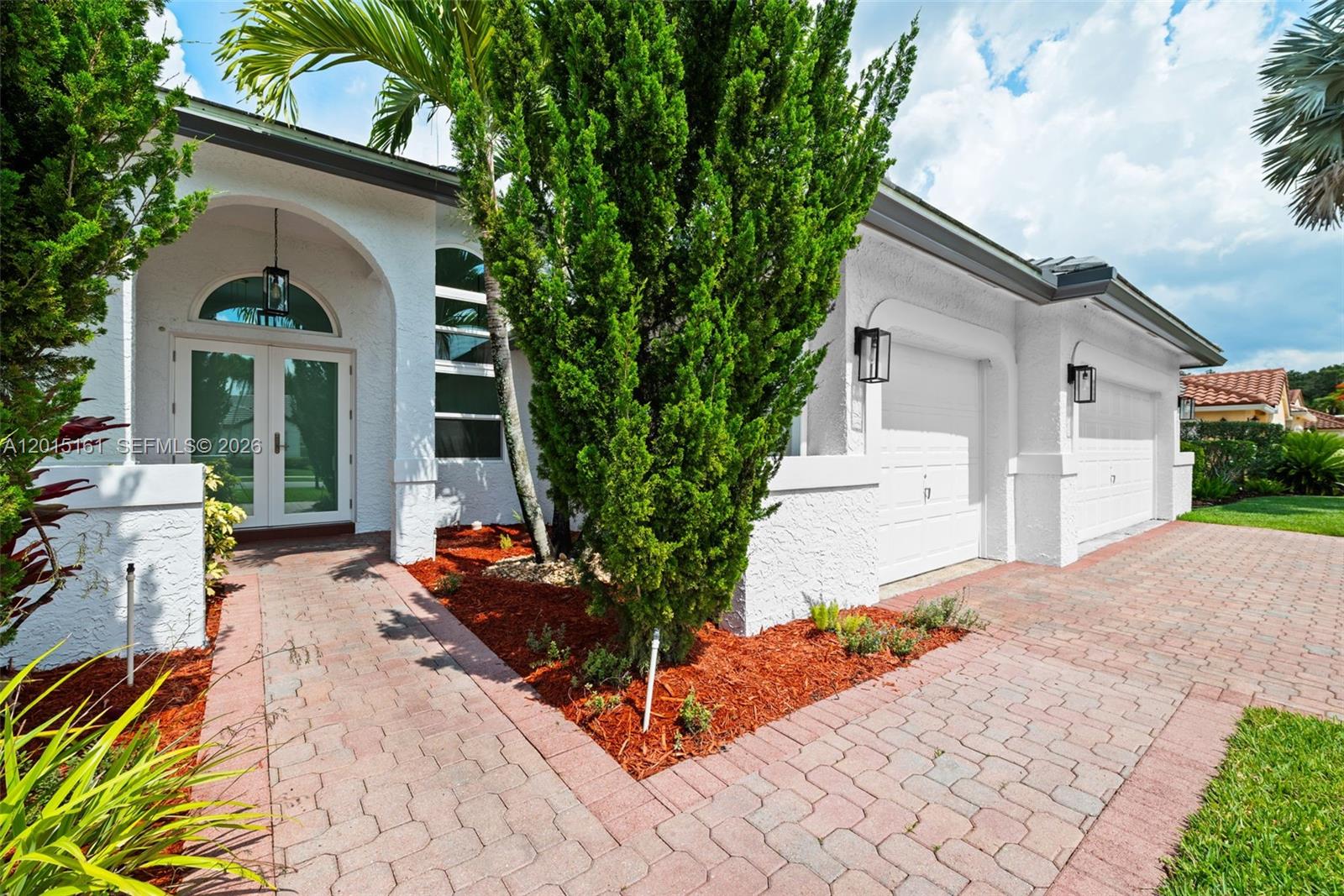 Florida living at its finest! This spectacular fully renovated 4-bedroom, 3-bathroom home with a 3-car garage offers luxury, style, & an incredible location in one of Davie’s most desirable settings. Completely redone from top to bottom, this move-in ready home features soaring ceilings, abundant natural light, gorgeous flooring throughout, & a highly desirable triple-split floor plan. The chef’s dream kitchen showcases premium finishes, custom cabinetry, upgraded appliances, expansive prep space, & an open-concept design flowing seamlessly into the spacious family room — perfect for entertaining. The fabulous primary suite is a private retreat featuring a designer-inspired spa bath, while the gorgeous secondary baths have also been beautifully updated with stylish modern finishes. Major upgrades include impact windows & doors, a new roof, & a stunning new sparkling pool with spa. Enjoy breathtaking scenic views overlooking the lake & the lush natural beauty of Tree Tops Park with peaceful tree canopies, walking & horse trails. This serene setting feels like country living while being just minutes from Broward’s beautiful beaches, downtown, the airport, Sawgrass Mills, Panther Arena, dining, shopping, & major highways for easy commuting. Community pool, plus top-rated Davie schools make this exceptional property even more desirable. Rarely does a home combine luxury renovations, privacy, resort-style outdoor living, & such a prime location all in one remarkable property.4/3