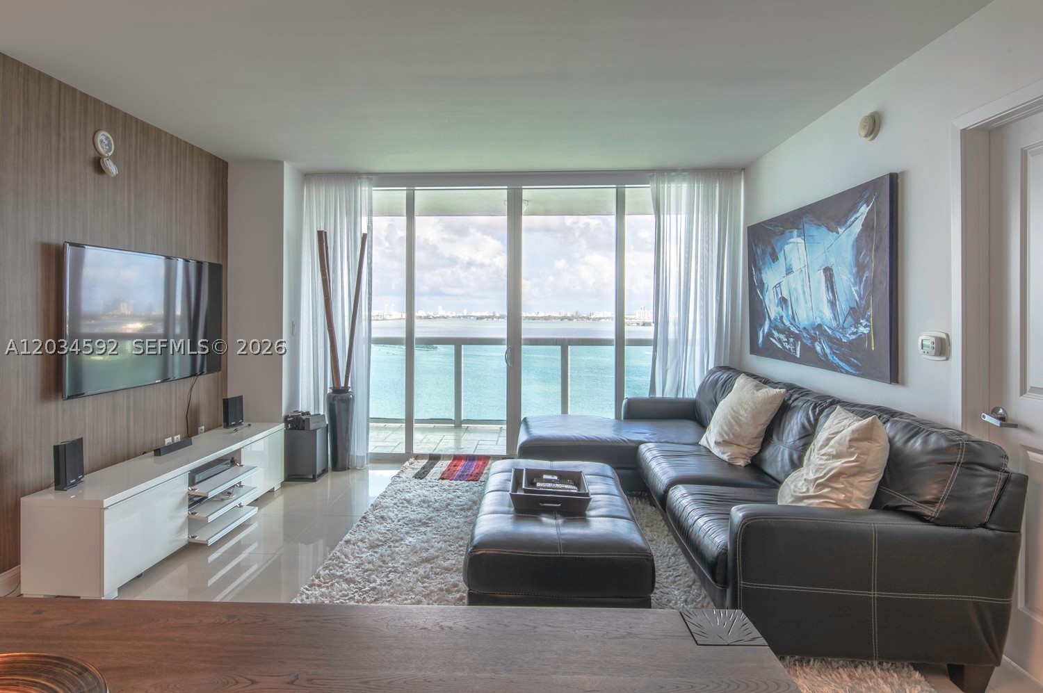 Gorgeous bay views from this beautiful 2/2 apartment in Edgewater. It features a large balcony, modern appliances, closets, electric shades and contemporary updates. Enjoy the fantastic amenities of this building, right at the heart of Miami, with the best views.