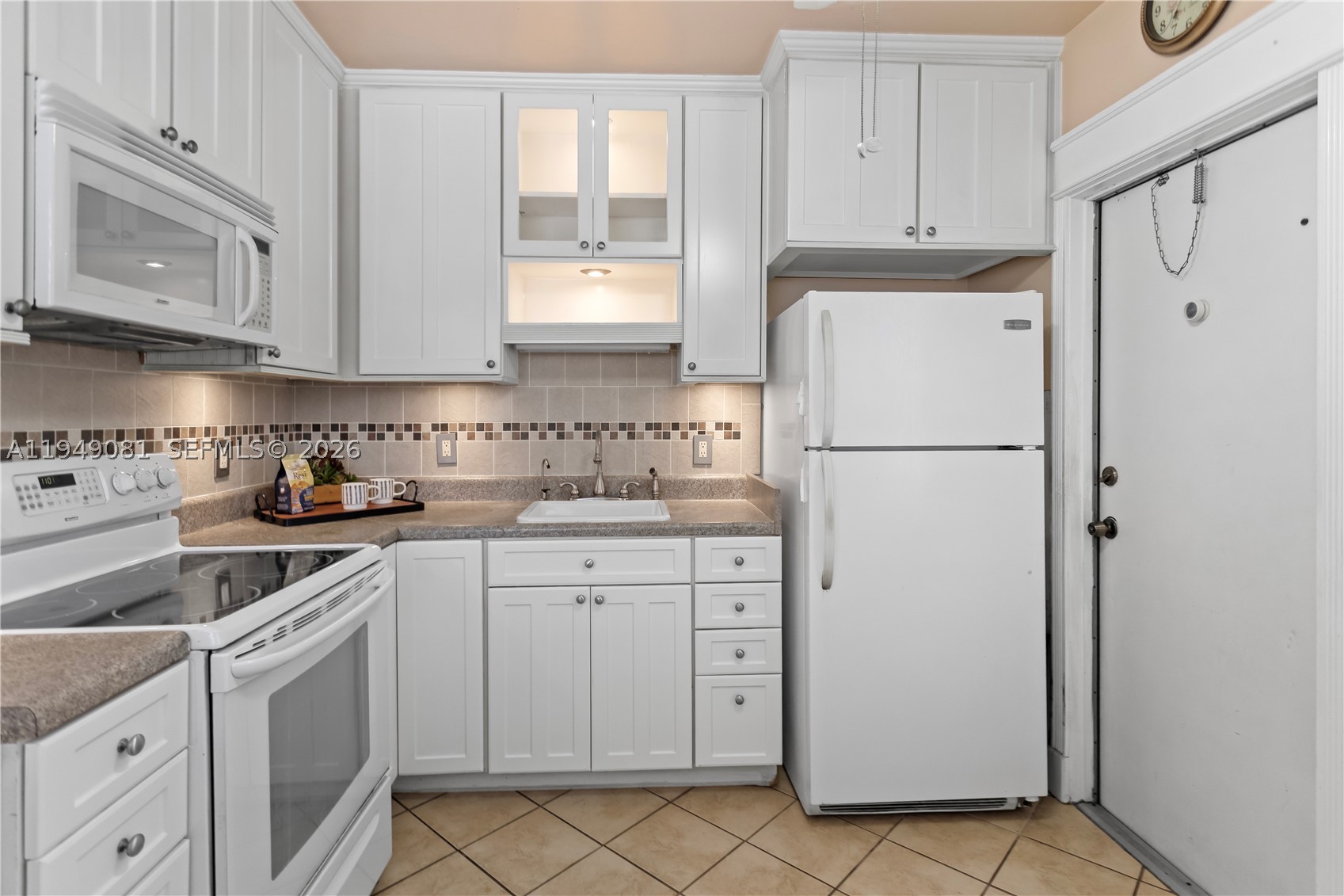 One occupant must be 55+; second occupant may be 18+. No minimum credit score or down payment required! NO SPECIAL ASSESSMENTS! Has RESERVES! LOW CONDO FEE OF ONLY $311/MONTH!

PRICE REDUCTION makes this an even more attractive and affordable opportunity for first-time homebuyers, seasonal residents, or those looking to downsize in a well-maintained 55+ community.

Bright and airy 2-bedroom, 1-bath second-floor corner unit with both front and rear entrances, providing abundant natural light and excellent cross-ventilation to enjoy refreshing breezes. Crown molding throughout adds a refined touch.

The spacious primary bedroom is complemented by a versatile second bedroom, perfect for guests, a home office, craft room, or reading retreat. Tile flooring enhances the main living areas, while the bedrooms feature attractive laminate flooring.

Additional highlights include a tankless water heater, hurricane panels conveniently stored on-site, and access to a clean, well-maintained community laundry facility.

No rentals permitted.