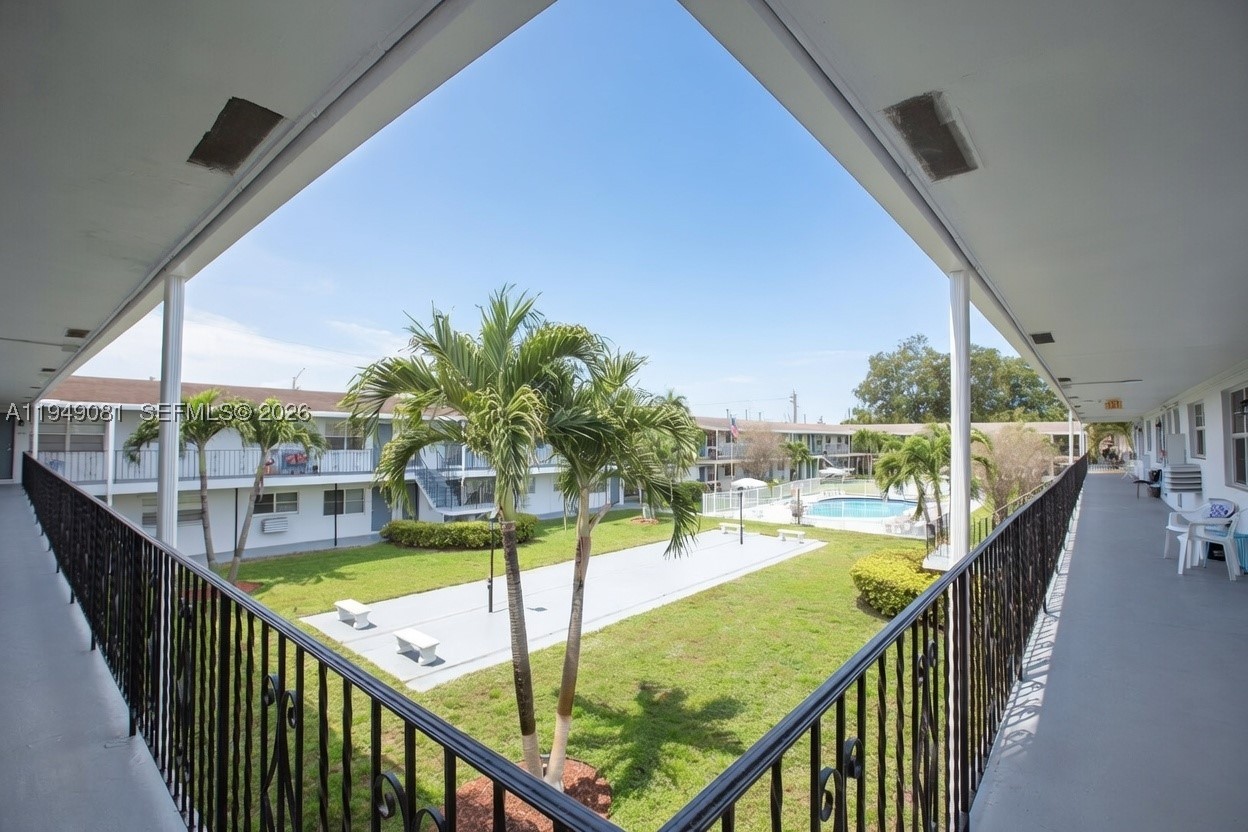 NO SPECIAL ASSESSMENT, RESERVES FUNDED, LOW HOA!!!  Great opportunity for first-time homebuyers or those looking to downsize in a well-maintained 55+ community! Enjoy low monthly maintenance of just $311, with reserves in place and no special assessments.  This bright and airy 2-bedroom, 1-bath second-floor corner unit offers both front and back entrances, allowing for abundant natural light and excellent cross ventilation to capture refreshing breezes. Crown molding throughout adds a refined touch.  The spacious primary bedroom is complemented by a versatile second bedroom—perfect for guests, a home office, craft room, or reading retreat. The home features tile flooring in the main living areas and laminate flooring in the bedrooms.  Additional highlights include a tankless water heater, a clean and well-maintained laundry facility, and hurricane panels conveniently stored on-site.  - PRICE REDUCTION... making this an even more attractive and affordable option!