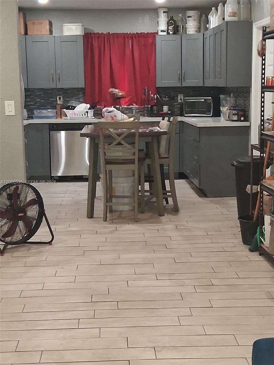Great opportunity for investors or first time home buyers. This gorgeous 2/1 that is actually a 3/2 home that just needs a little TLC sits on a double lot.  Permits where pulled to make the addition but was not closed .This property is full of potential and growth , the buyer of this property shall assume all existing liens , permits and violations associated whit the property