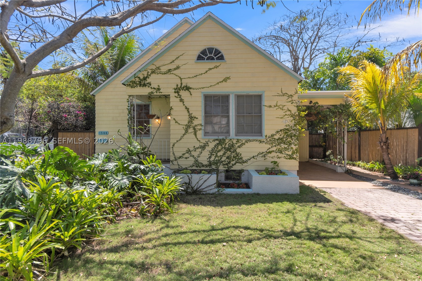 A tropical key west style oasis in the heart of east Hollywood! Just around the corner from young circle and the beaches, this home has unmatched landscaping and true character, unlike the majority of homes in today's market. 3 spacious bedrooms, 2 full bathrooms, new roof (2025), all plumbing and electrical re-done, and a backyard that transcends you to margaritaville. Massive florida room opening to patio overlooking garden, rooftop deck/enclosed second patio, outdoor storage/work shed, koi pond (which can be converted into pool or simply filled as more yard space, and another large section to the backyard which is simply fenced off and used for a large 32' boat. Enjoy the freedom of no HOA- allowed to keep a boat, RV, etc. Home is built from extremely durable Florida Pine, and a combination of frame/CBS construction to last lifetimes.