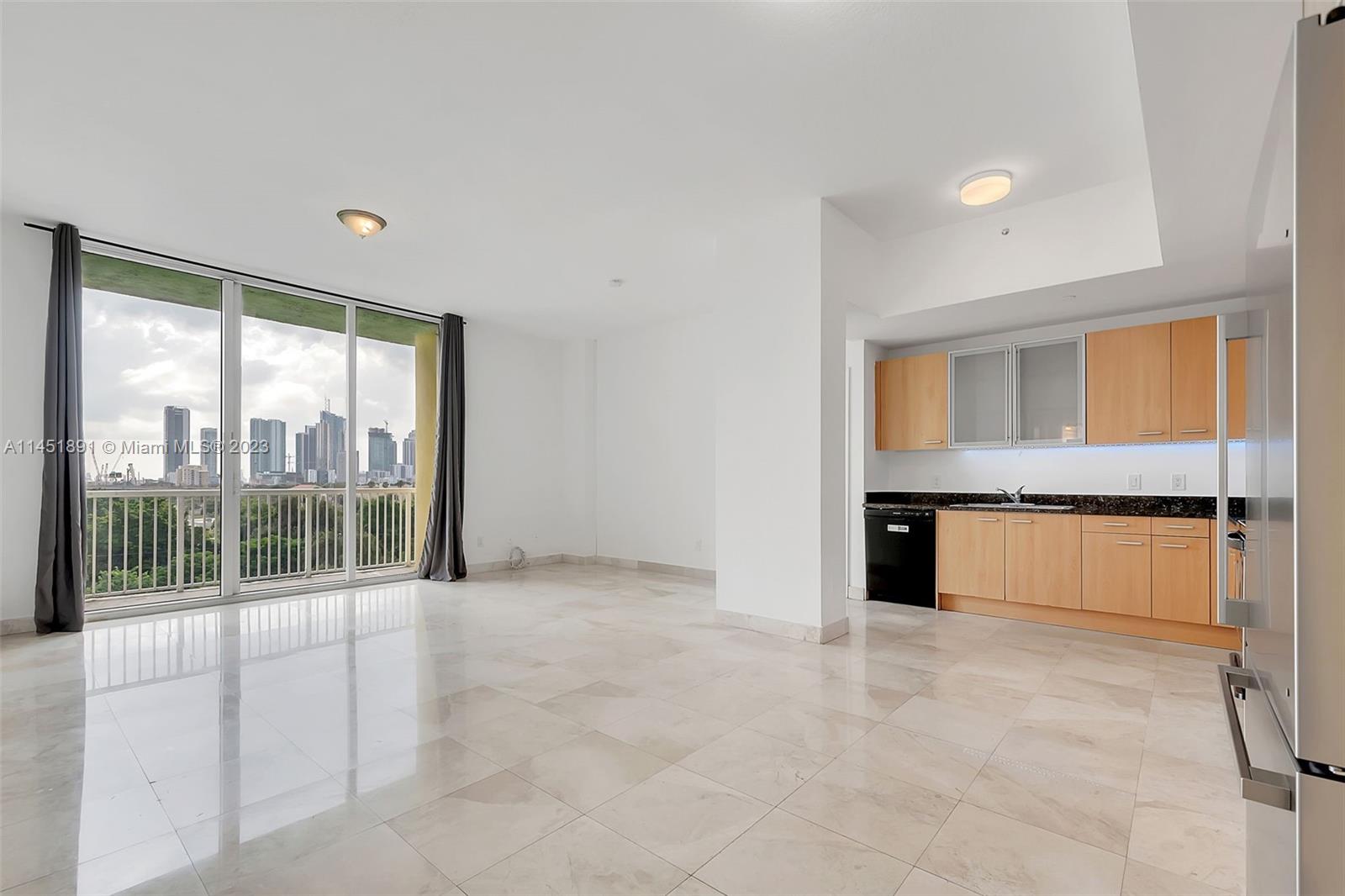Remodeled condo in a boutique building with a Miami Skyline View! This spacious 2 bedroom, 2 bathroom, split floorplan has an open living room and kitchen for entertainment. Features a washer and dryer inside the unit, hurricane impact windows & doors, stainless steel kitchen appliances & 1 assigned parking space in garage. It is conveniently located in the Miami Health District with easy access to the Design District, Downtown Miami, Wynwood, Brickell and the Beaches. The association requires a $500 common area deposit