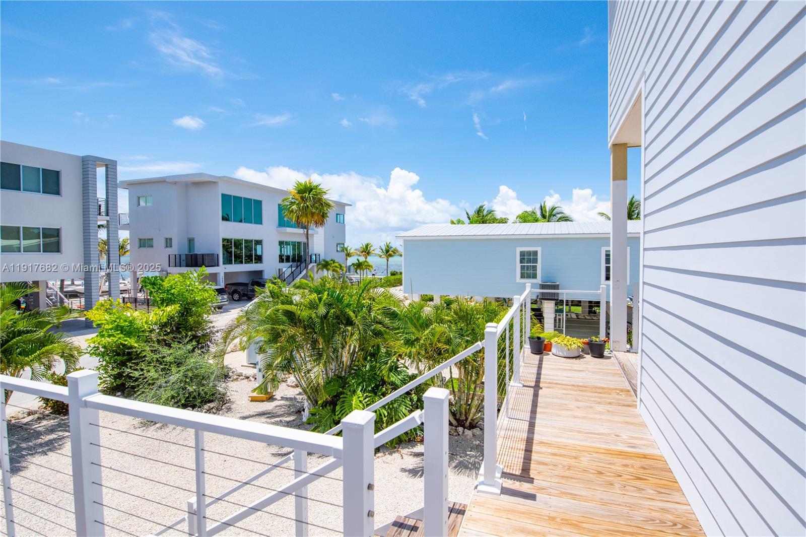 Welcome to your fully renovated coastal retreat in the heart of Marathon, Florida! This stunning 4 bedroom, 3 bathroom home offers two Master suites, breathtaking open water views and is just minutes from the Marathon Airport—perfect for aviation lovers. Step inside to find a modern, newly updated interior featuring a spacious floor plan, brand new roof, and high-end finishes throughout. The home includes a private lock-out suite ideal for guests or extended family. Whether you're relaxing on the porch watching the sunrise over the water or arriving by plane for a weekend getaway, this home offers the ultimate in Florida Keys living. Don't miss your chance to own a slice of paradise in Marathon Key!