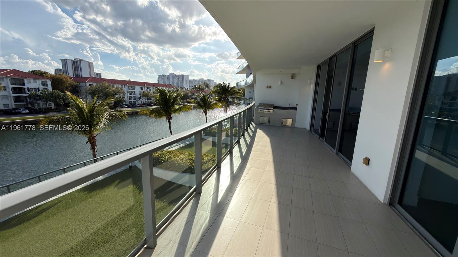Echo Aventura, designed by architect Carlo Ott, features extra-large units with private elevators and oversized balcony terraces with grills. This unit includes a separate sleeping and bathing area for staff. Echo Aventura units are smart homes with integrated ceiling speakers in every room and high-end finishes like Gaggenau espresso machines and real gas stovetops, along with extra-high ceilings and custom cabinetry. Amenities include a pool with towel service, complimentary transportation to Aventura Mall or the beach, dog walking services, an on-site car wash, and a dog walking area along the water. The gym features advanced Cybex equipment and group classes with an onsite trainer. Residents enjoy a monthly resort visit, freshly ground coffee, E-bikes, and EV charging stations.