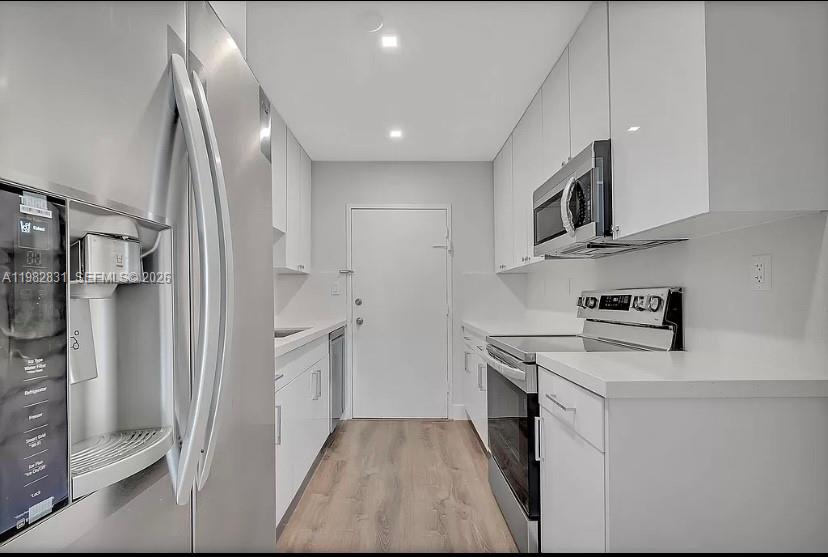 THE CARRIAGE HOUSE CONDO - Residential