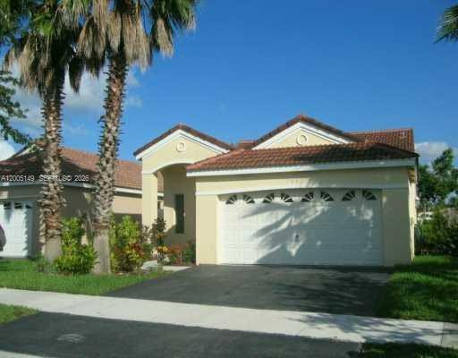 Beautiful one-story home located in the highly desirable gated community of San Remo in Weston. This 3-bedroom, 2-bath residence offers a functional layout with tile flooring throughout, abundant natural light, and peaceful garden views. Larger model compared to recent sales in the community, offering added living space and a spacious 2-car garage. Conveniently located within walking distance to Eagle Point Elementary and close to parks, shopping, dining, and I-75.Community amenities include pool and clubhouse with low HOA. Excellent opportunity to own in one of Weston’s most sought-after neighborhoods with top-rated schools. Easy to show.