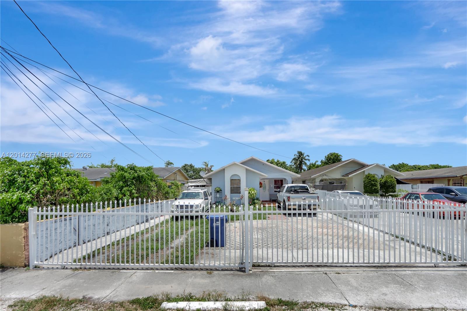 Don't miss out on this multi-family with High Potential in Opa Locka. This property features 3 units that can produce great return. This property is perfectly positioned for long-term and short-term rental opportunities. Brand new roof. Area is zoned 2-9 units. Don't miss out on this incredible investment opportunity(Walk-thru video link attached). Sewer line has been 3 houses down. Owner financing available with great terms. Adjacent property also being sold!
