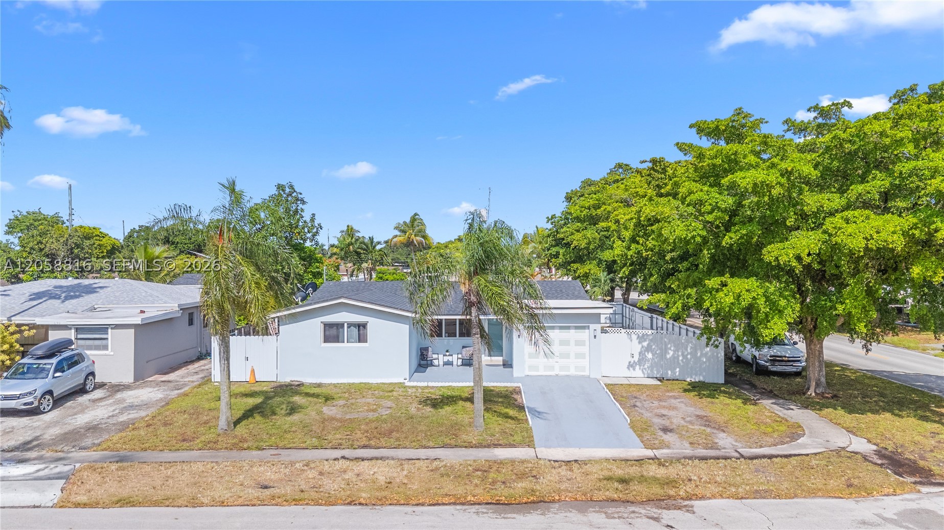 I would like to introduce this fantastic move-in ready home ideally located in Broward County, just minutes from the Seminole Hard Rock Hotel & Casino, Hollywood Beach, and Pembroke Pines. This property features 3 comfortable bedrooms, 1 full bathroom, and potential for in-law suite quarters. The home offers a large open kitchen, a large concrete terrace, and a fully fenced yard with access from both sides of the property, as well as a separate rear entrance with a gate. Recent upgrades include a brand-new roof and impact windows and doors. The property is equipped with city gas service. The expansive, fully fenced backyard featuring a large concrete terrace is ideal for entertaining family and friends. Dual-side access and a dedicated separate rear entrance with a private gate provide maximum convenience and endless potential for parking or storage. With no HOA restrictions, this property gives you complete freedom and flexibility. It is conveniently situated near top-rated dining, shopping, major highways, and beaches.
