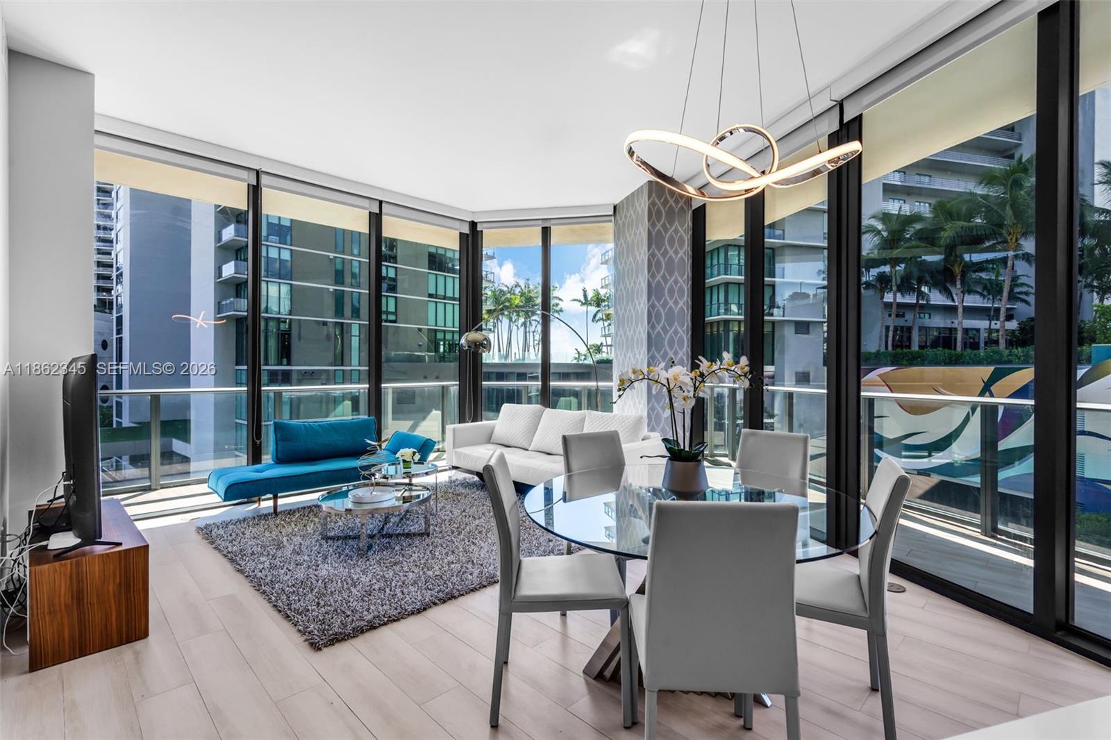 Best value in the building for a furnished 3-bedroom, 2-bath corner residence at Paraiso Bayviews. 1,152 sq ft of bright, modern living space with floor-to-ceiling windows and abundant natural light throughout. Open-concept kitchen with premium appliances. Offered fully furnished and move-in ready. Convenient assigned parking. Cable and WiFi included in HOA fees. Enjoy rooftop pool with panoramic bay and city views, fitness center, spa, tennis courts, kids’ playroom, and resident lounge. Prime Edgewater location—minutes to the Design District, Midtown, Wynwood, Downtown, Miami Beach, Publix, Whole Foods Market, and MIA. Turnkey opportunity. Easy to show.