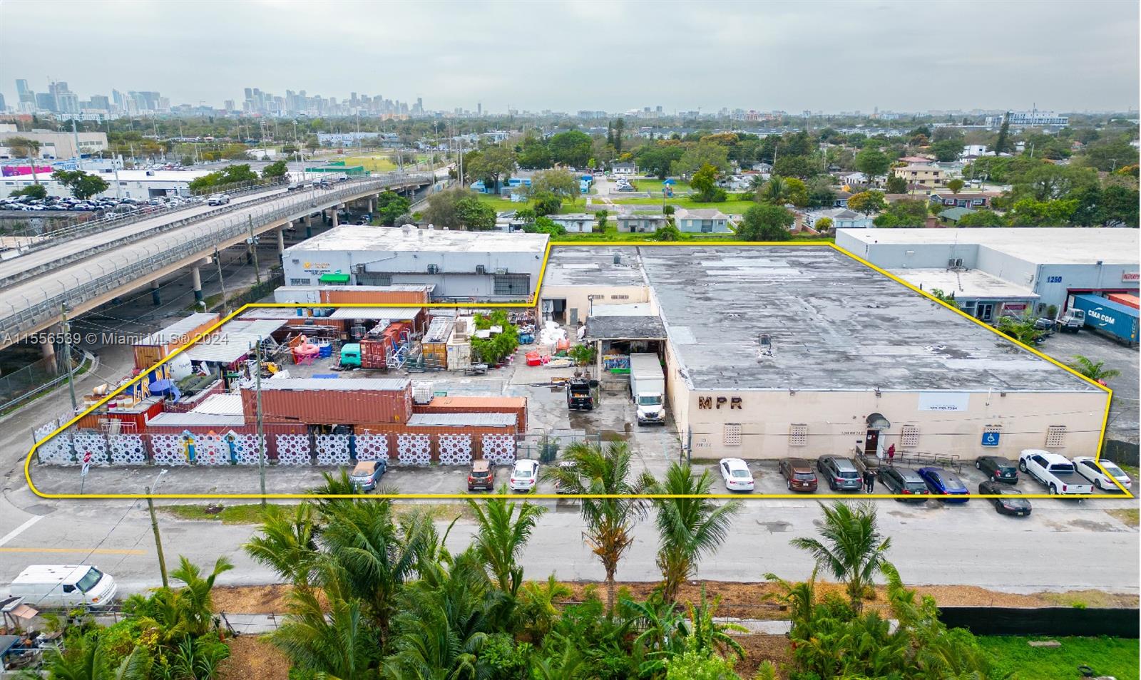 Opportunity to purchase a 30,000 square foot warehouse on a 65,000 square foot lot in West Little River.
The warehouse has 18 foot ceilings with 14 foot clear heights and features an expansive open layout with a large outdoor area, featuring two loading ramps, one with dock height accessibility, and a third loading dock in the back of the property. The property has six roll up doors. It also has numerous industrial fans and the main section of the warehouse and office space are under AC. There is parking at the front of the building as well. The building is 100% sprinklered.
The property is also located in a Qualified Opportunity Zone.
The property is currently occupied by a successful movie, tv, event, and advertisement prop business netting approximately $1.1 million/year.