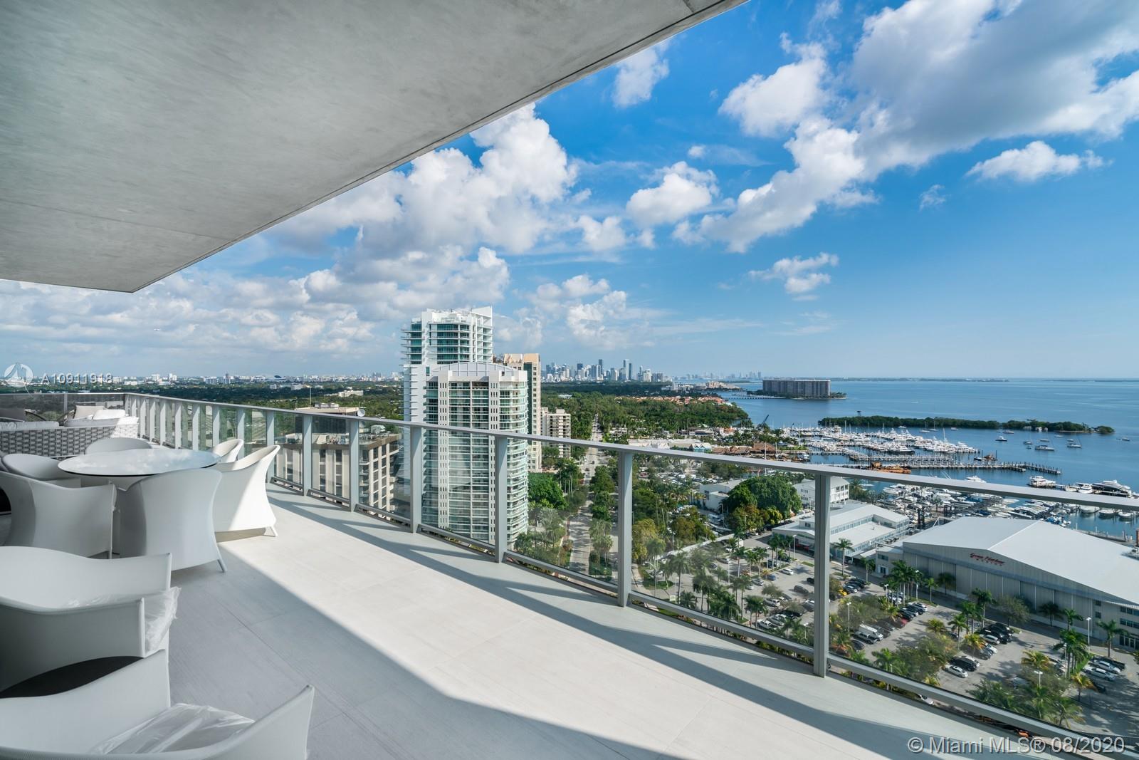 Spectacular turn-key residence located in the most iconic building in Coconut Grove, Grove at Grand Bay by star architect Bjarke Engels! Chic and elegant, decorated and custom finished by renowned interior designer this contemporary masterpiece is being offered fully furnished. Private elevators open into beautiful gallery entrance with custom woodwork and onyx walls perfect for the avid art collector. Magnificent dining and living areas with Marble walls and custom built ins are perfect for entertaining. Gorgeous panoramic views of the city and Biscayne Bay. 24x48 Italian Porcelain floors and stunning hardwood floors throughout. Desirable split floorplan with additional family room.