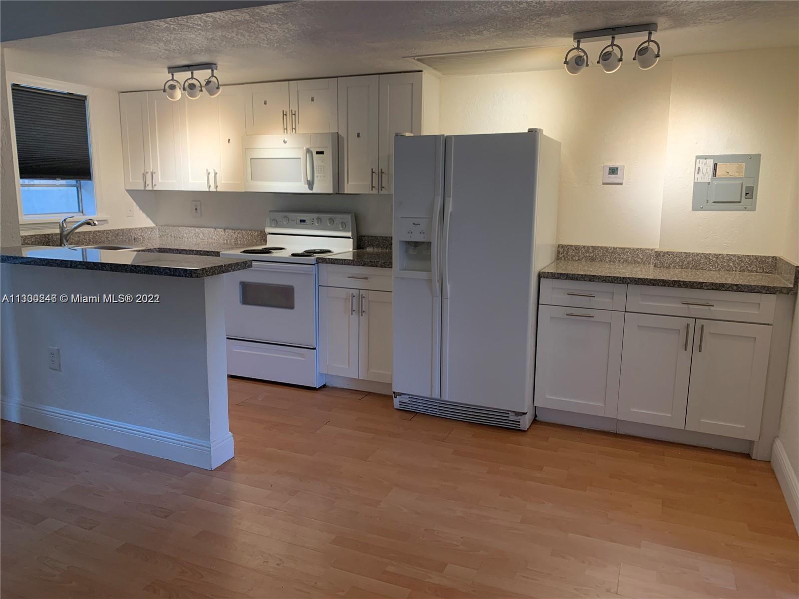 VILLAS OF WEST BIRD CONDO - Residential Lease