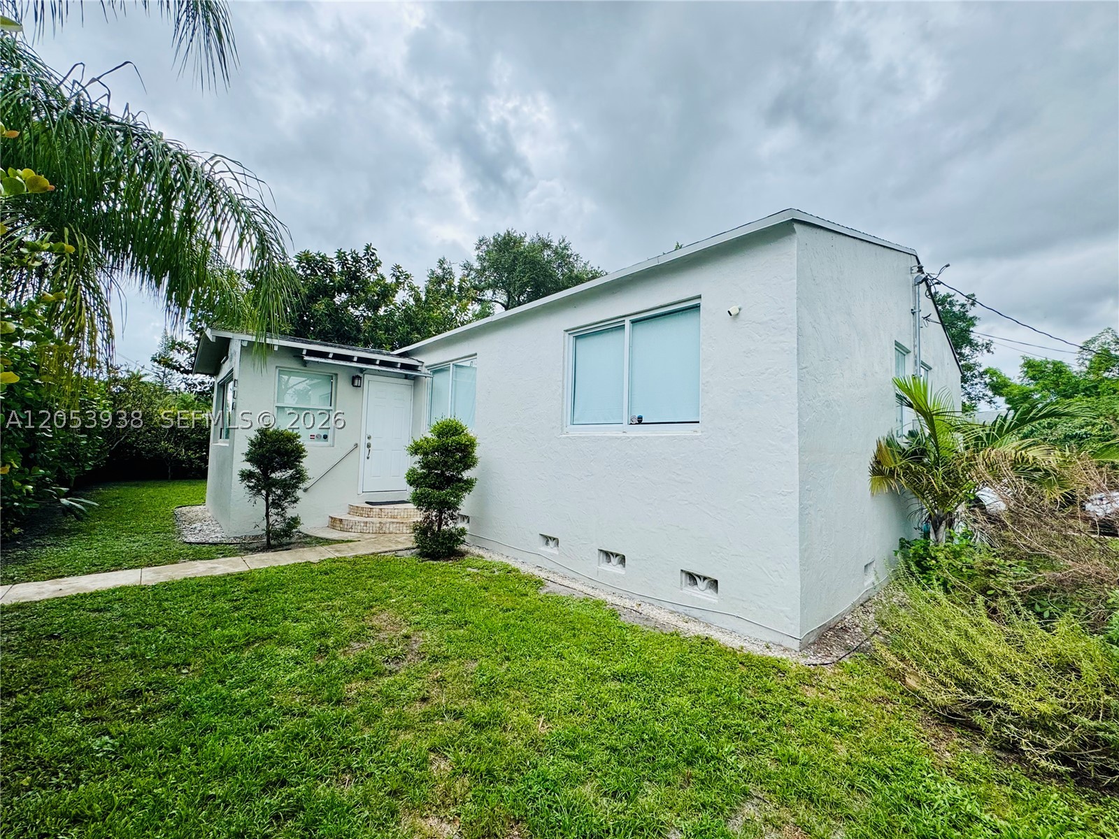 Cozy & Spacious 3B/2B Single Family Home in the Heart of Hollywood! Beautiful layout with new floors, updated bathrooms and an extra front entry room. HUGE backyard, perfect for kids and pets. One car garage with additional 2 spaces in front of garage. Private, fenced in home with impact windows and new roof. Minutes to downtown Hollywood, all major shops and restaurants, I-95, beaches and airports. Farmer's Market steps away! A MUST SEE!!!