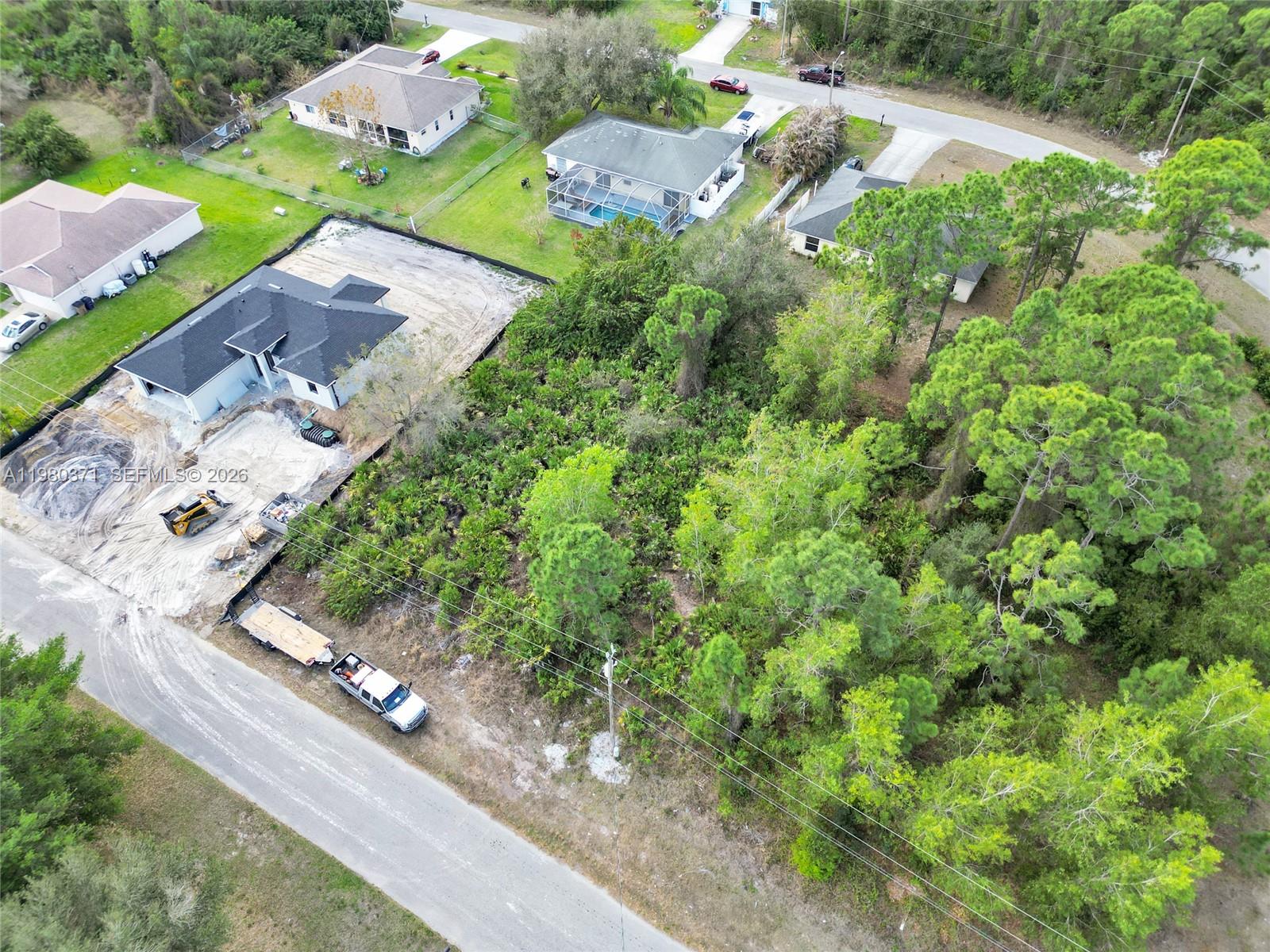 VERY NICE 1/4 ACRE LOT IN A FABULOUS SECTION. PAVED ROADS, ELECTRIC POLES IN PLACE. LOTS OF DEVELOPMENT GOING ON. CLOSE TO HWY 82, SHOPPING, ETC.
OWNER IS WILLING TO HOLD A FIRST MORTGAGE WITH $10000 DOWN AT 8% ANNUAL RATE, $500 PER MONTH AND 5 YEAR BALLOON.
INTRODUCTION IS AVAILABLE TO BUILDER WHO CAN BUILD A 3/2 WITH 2 GARAGE FOR APPX 235K; HOUSE IS 1951 SQ FT, PORCELAIN FLOORING, QUARTZ KITCHEN COUNTER TOP, HIGH IMPACT WINDOWS, ETC.