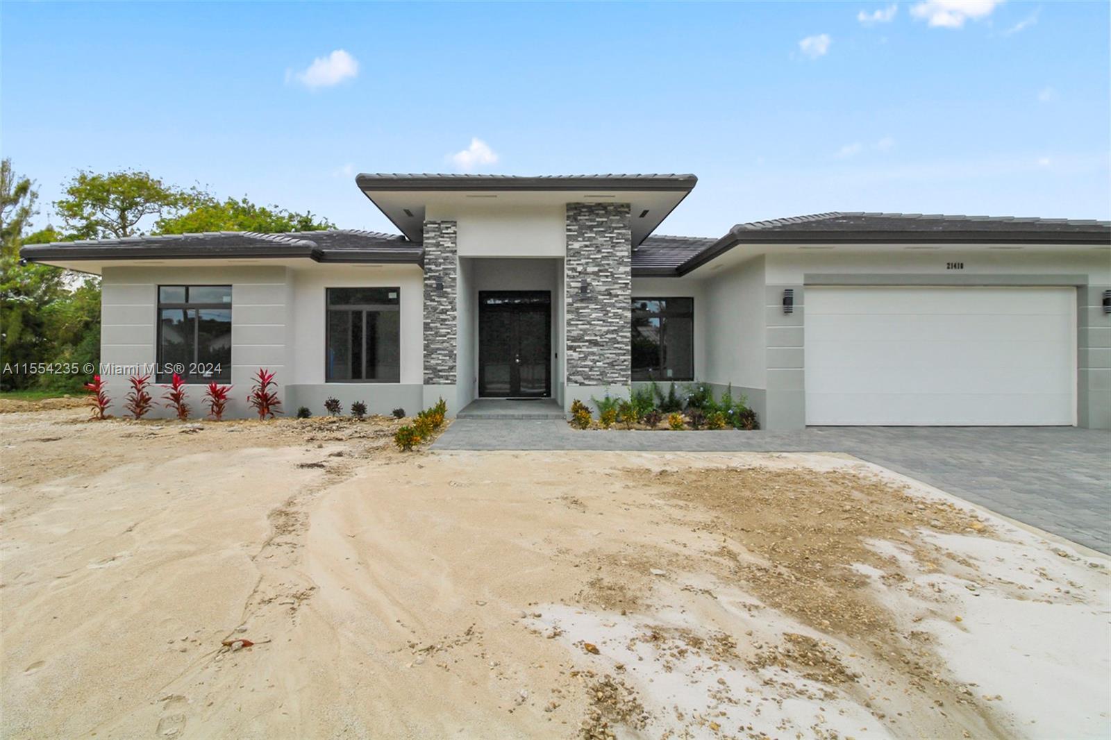Welcome to your dream home in Cutler Bay! This stunning single-family home boasts 4 bedrooms, 3.5 bathrooms, and a 2-car garage.The modern kitchen features stainless steel appliances, quartz countertops, and extra storage cabinets that extend all the way to the ceiling. The tile flooring and 10 ft ceiling height throughout the home create a sense of luxury and elegance, while the impact doors and windows provide security and peace of mind. The primary bedroom includes a huge closet with cabinets. The bathroom is equipped with a shower and a modern bathtub. LED lights illuminate the entire home. Step outside to the covered terrace and enjoy the beautiful Florida weather. No HOA