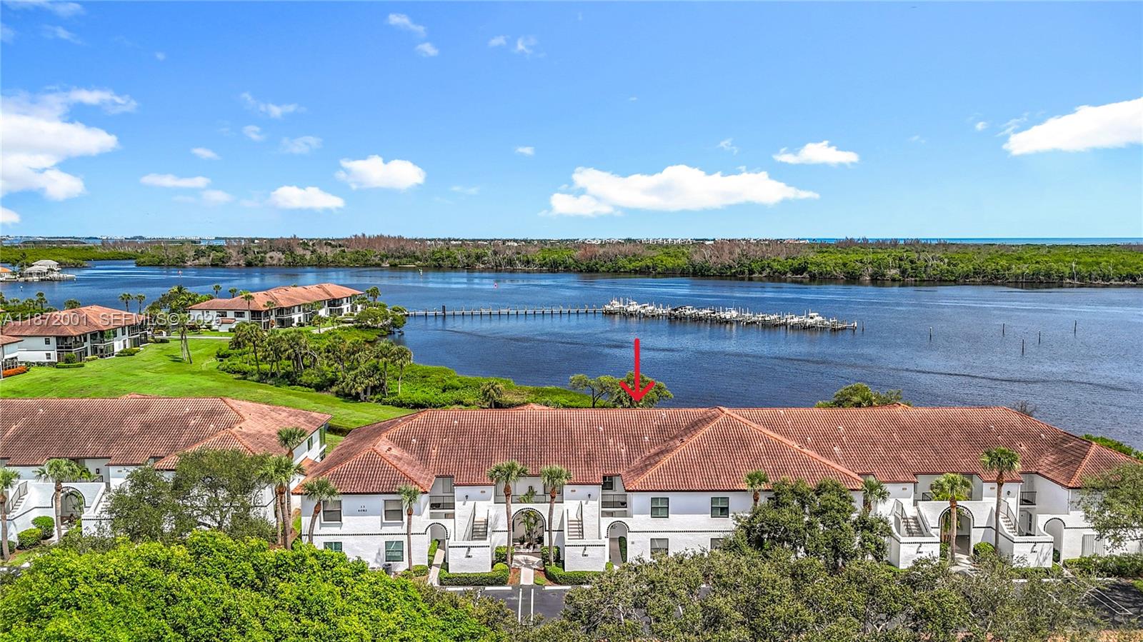 SPECTACULAR VIEWS OF THE INTRACOASTAL WATERWAY!  Renovated 2/2 - Penthouse Unit with VAULTED CEILINGS* IMPACT GLASS Enclosed Balcony & Accordion Hurricane Shutters Throughout* Skylight in Kitchen & Master Bath Suite* Plantation Shutters* Luxury Wood Cabinets in Kitchen w/Soft Close Drawers & Granite Countertops* Full Size Washer & Dryer* Attic Access Storage w/Pull Down Ladder* Exterior Storage in Building* Carport* NEW ROOFS* Maintenance Fee Includes Building Insurance, Roof Maintenance, Landscaping, Clubhouse Amenities, Heated Pool, Jacuzzi, Tennis, Pickleball, Barbecue Grills, Cable & Internet.  *ENJOY WATERFRONT LIVING WITH MAGNIFICANT VIEWS* Boat Docks Available for Sale/Lease* NO Fixed Bridges* Boaters' Paradise!!