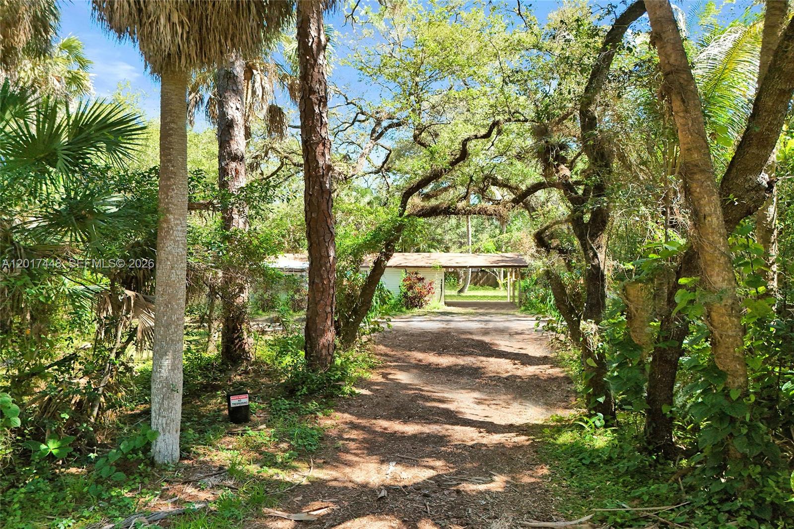 Exceptional opportunity in Riverland with a massive 24,755 SQFT lot zoned RS-3.52. We can help you develop the property with new construction and/or renovate the home for a "buy & hold deal." Whether you choose to remodel the existing 2-bedroom home, build your dream estate, or take advantage of the potential to divide the property into two separate lots approximately 10,000–12,000 SQFT each, the possibilities here are outstanding.
The property is beautifully framed by gorgeous mature oak trees, creating a private and picturesque setting.  Conveniently located near I-95, I-595, the Florida Turnpike, and Seminole Hard Rock Hotel & Casino Hollywood, this location offers quick access to all of South Florida.
Outdoor enthusiasts will love the nearby public boat ramp less than a mile away, making it incredibly easy to trailer a boat, jet skis, or other recreational toys. A rare oversized lot opportunity in a rapidly growing neighborhood with endless potential. SOLD AS IS!