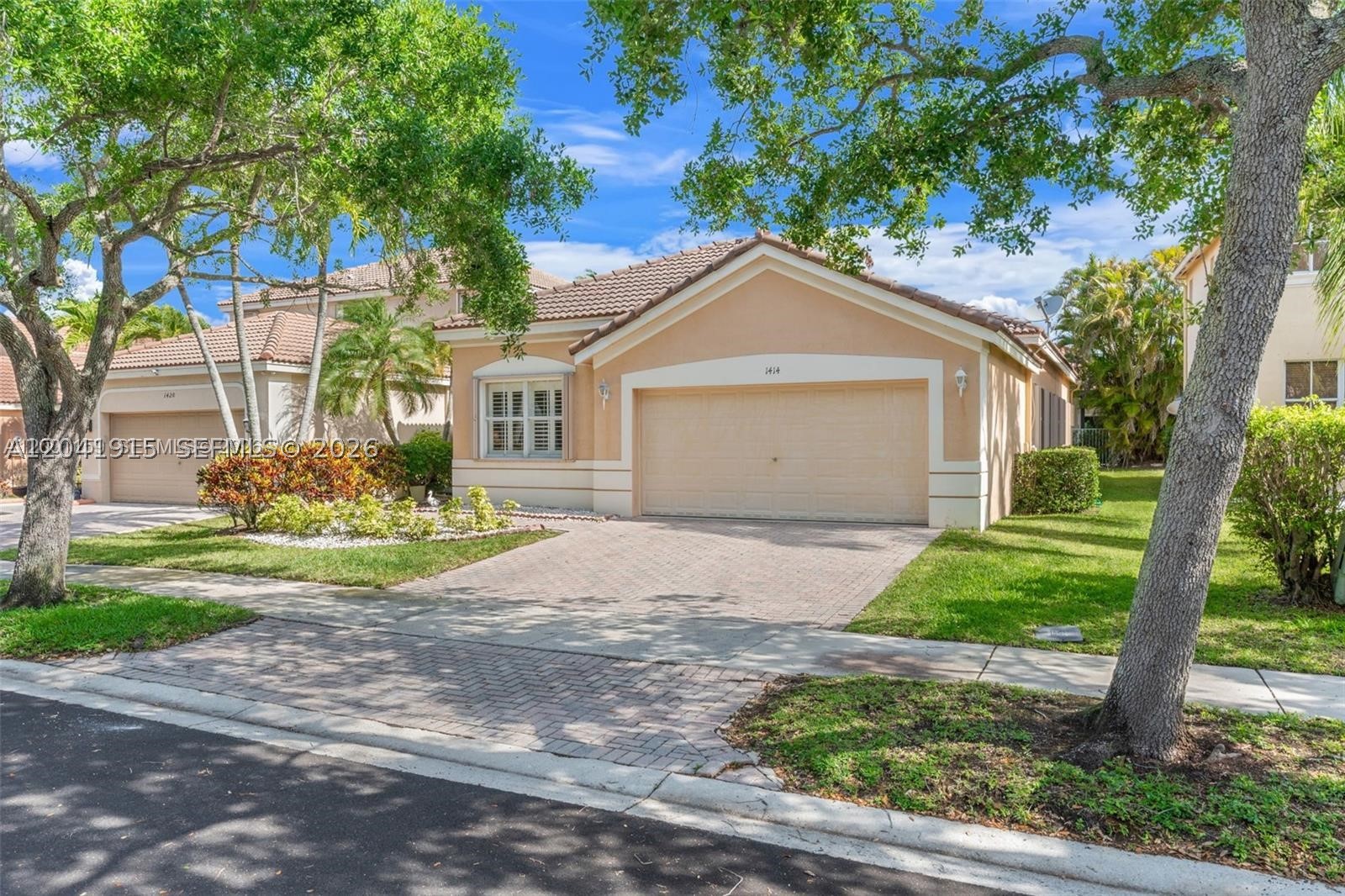 Located in the highly desirable gated community of Savanna, this beautiful extra-large 3-bedroom, 2-bathroom home stands out with impressive 9-foot ceilings that create a bright, open, and elegant feel throughout. The spacious floor plan features a welcoming living and dining area, a comfortable family room, and a bright breakfast nook perfect for casual dining and everyday living. The functional kitchen offers great flow for both convenience and entertaining. Accordion shutters. Enjoy resort-style living with access to Savanna’s clubhouse, pools, playgrounds, sports courts, and scenic walking paths, all within a secure, family-friendly community. Ideally located near top-rated Weston schools, parks, shopping, dining, and major highways