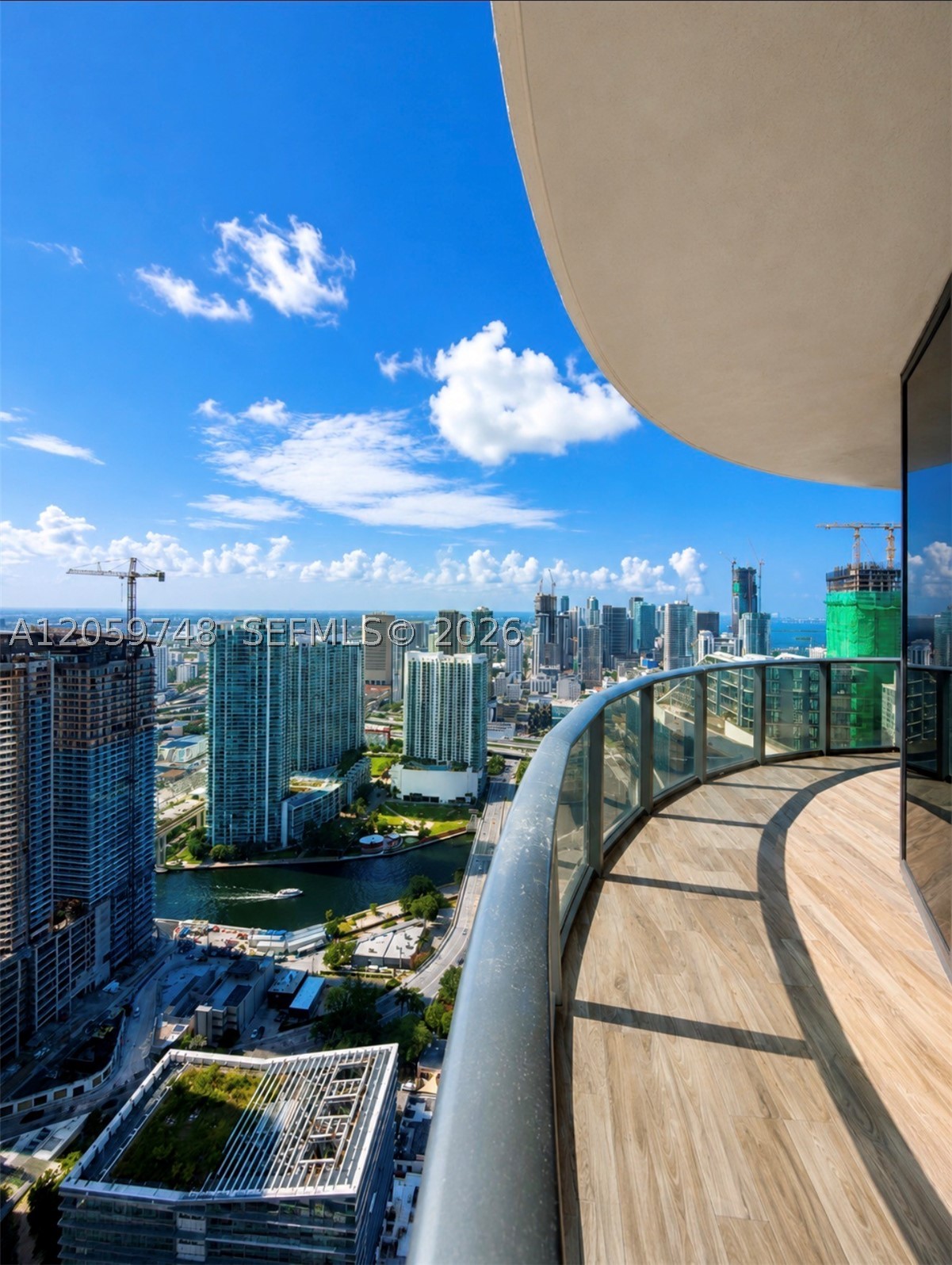 Experience luxury living from the highest lower penthouse level at SLS LUX Brickell. Perched on the 55th floor, this exceptional corner residence features 3 bedrooms, 3 bathrooms, and impressive 10-foot ceilings. As the highest residence with this sought-after floor plan, it offers a unique vantage point, clearing EAST Miami Hotel to the north, Brickell Heights and Rise at Brickell City Centre to the west, creating rare, unobstructed 270-degree panoramic views of the Miami skyline. Expansive southern exposure also captures spectacular Biscayne Bay views.

A private elevator opens directly into your foyer, leading to a light-filled living space enhanced by this floor plan's signature all-glass living room with floor-to-ceiling impact glass. The wraparound terrace seamlessly extends the living space outdoors. Designer finishes include porcelain flooring, an Italkraft kitchen with marble countertops, and premium Sub-Zero appliances.

SLS LUX offers a true five-star lifestyle with separate private entrances for residences and hotel. Residents enjoy two resort-style pools, a state-of-the-art fitness center, full-service spa with separate men's and women's steam rooms, tennis and basketball court, indoor and outdoor children's play areas with a rock-climbing wall, concierge, valet, and 24-hour security. Ideally located across from Brickell City Centre and steps from Miami's premier dining, shopping, and entertainment.