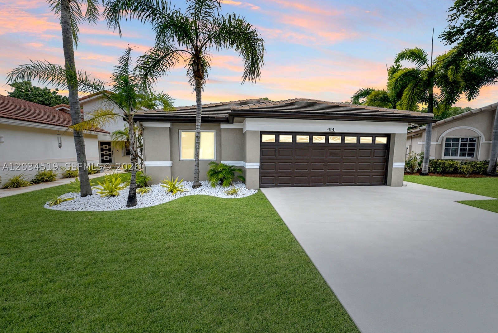 Located in the Silver Lakes community of West Pembroke Pines, this one story home offers 3 bedrooms, 2 bathrooms, and a 2 car garage. The home features a 2 year old roof and hurricane impact glass throughout for added peace of mind. Bright and open living spaces are complemented by tile flooring throughout the home. The updated kitchen features beautiful espresso colored cabinetry, granite countertops, stainless steel appliances, and flows seamlessly into the dining area. A decorative accent wall provides definition between the living and dining spaces while maintaining an open and connected feel. The bathrooms have also been updated with matching espresso colored cabinetry, creating a cohesive design throughout the home. Step outside to enjoy a fenced backyard offering privacy, a covered tiled patio for outdoor dining or relaxation, and plenty of green space to enjoy nature. Located in the west Pembroke Pines school district and  conveniently near shopping, dining, parks, and major roadways, this home offers a wonderful combination of comfort, style, and location. No Rentals Allowed.